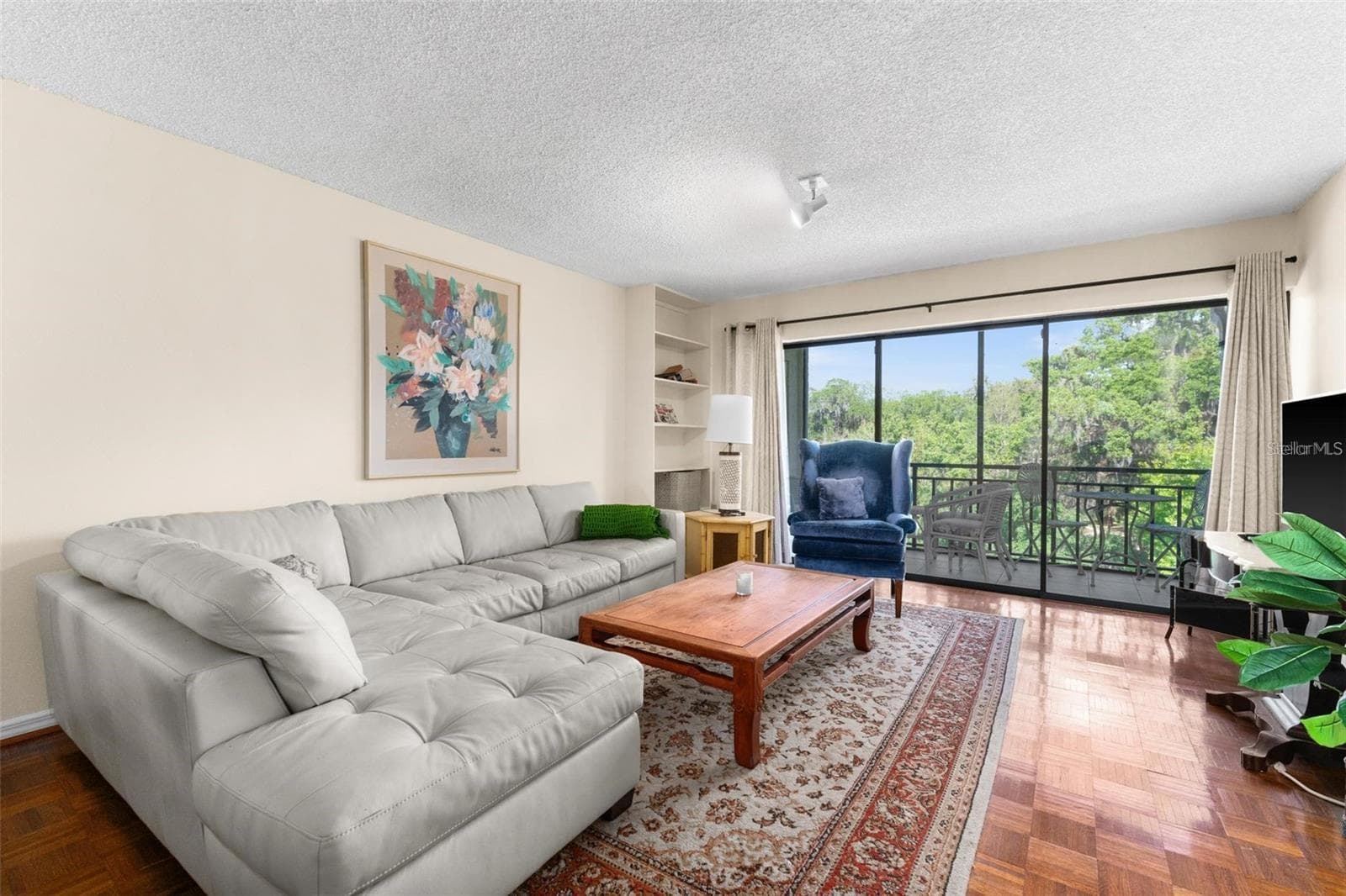 Living Room to Screened Lanai - 1162 CARMEL CIR #440, CASSELBERRY