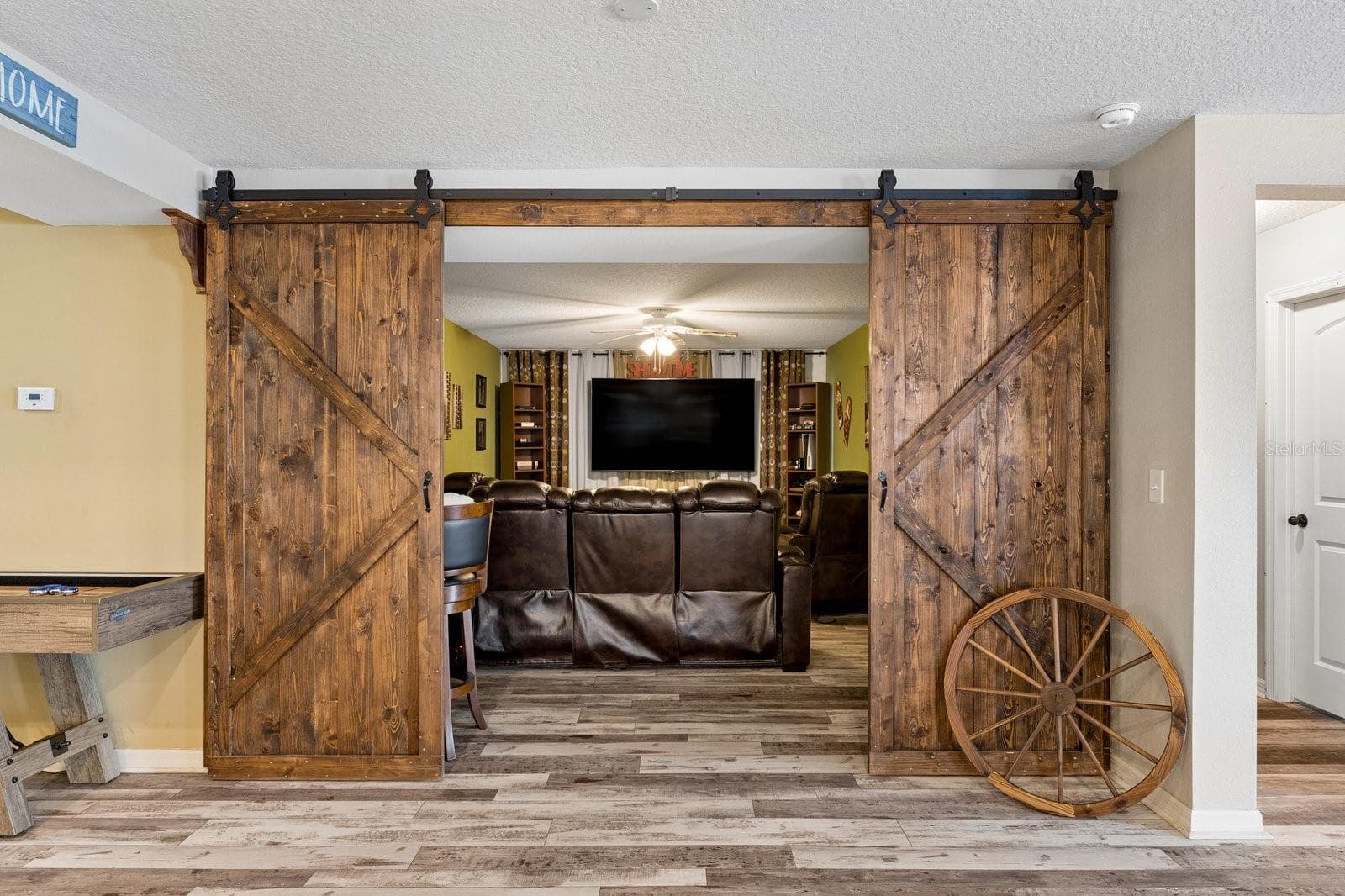 Theater room doors from living room - 11327 BRIGHTON KNOLL LOOP, RIVERVIEW