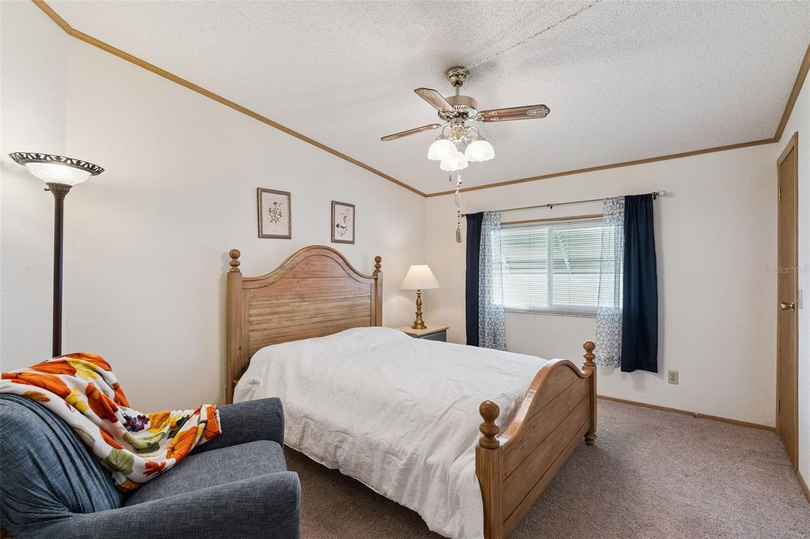 Guest bedroom with ceiling fan and window - 25038 CLIFFORD HL, LEESBURG