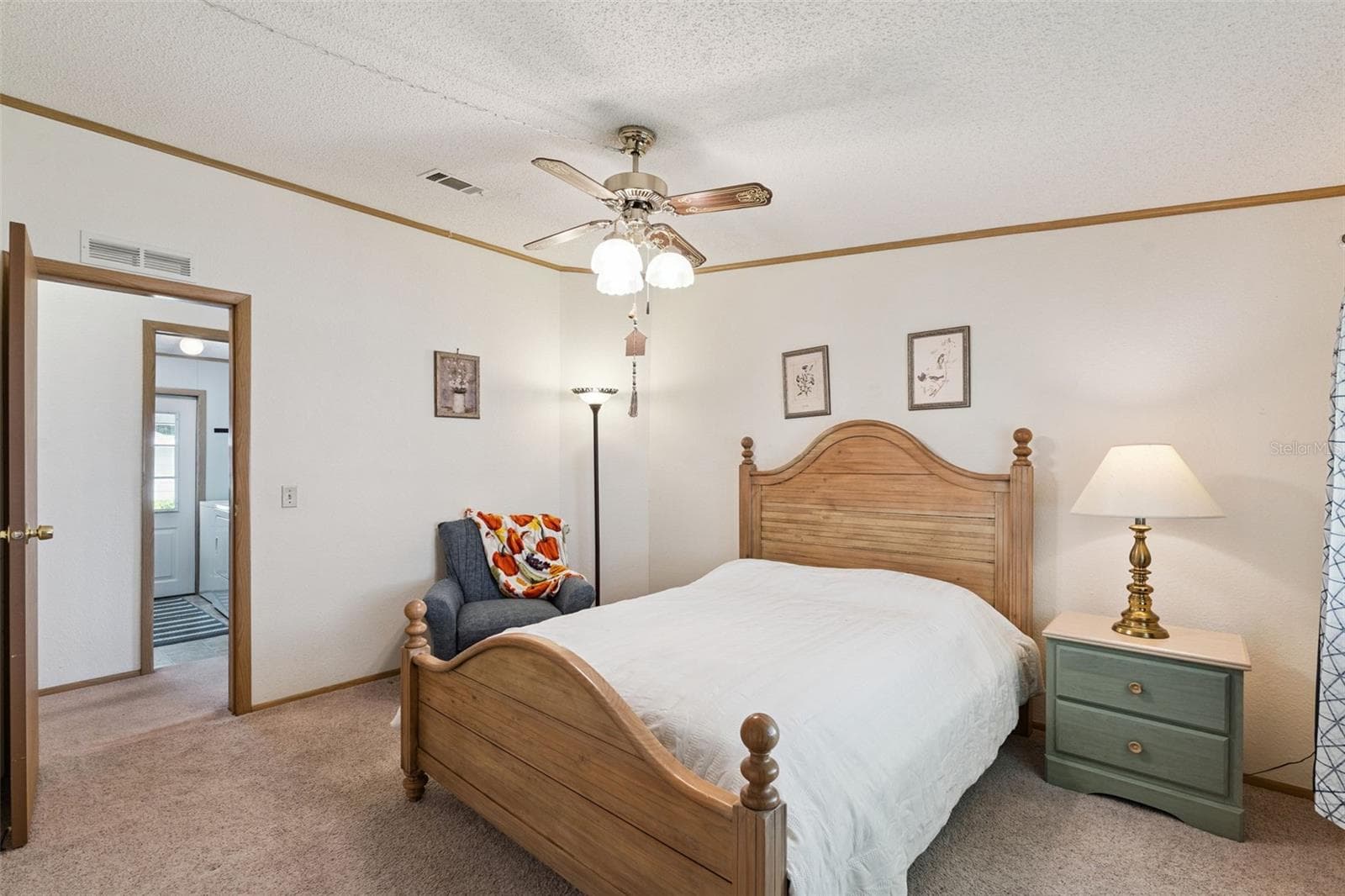 Guest bedroom with ceiling fan and doorway to the hall - 25038 CLIFFORD HL, LEESBURG