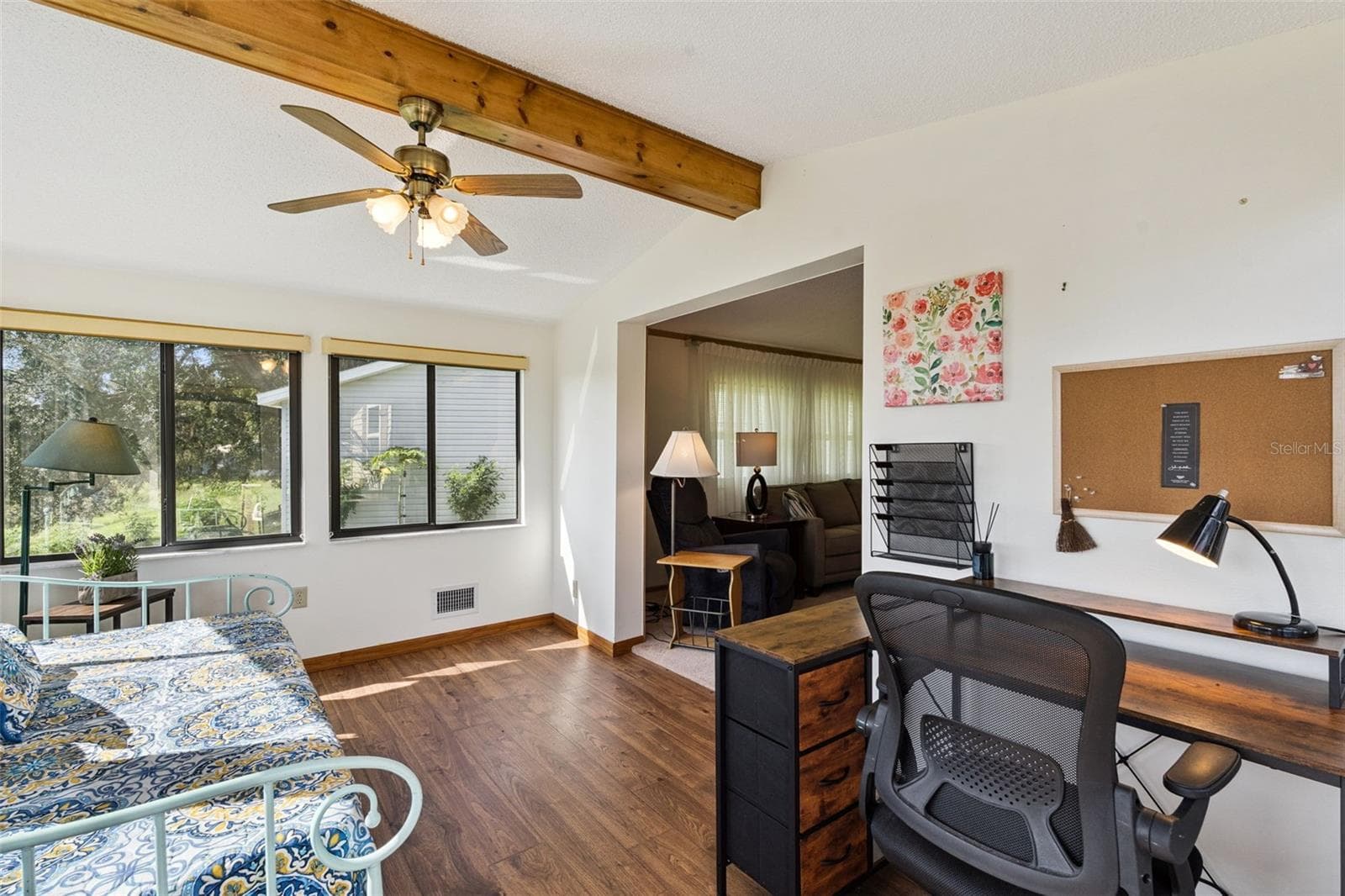 Sunroom with windows on three sides and a beamed vaulted ceiling - 25038 CLIFFORD HL, LEESBURG