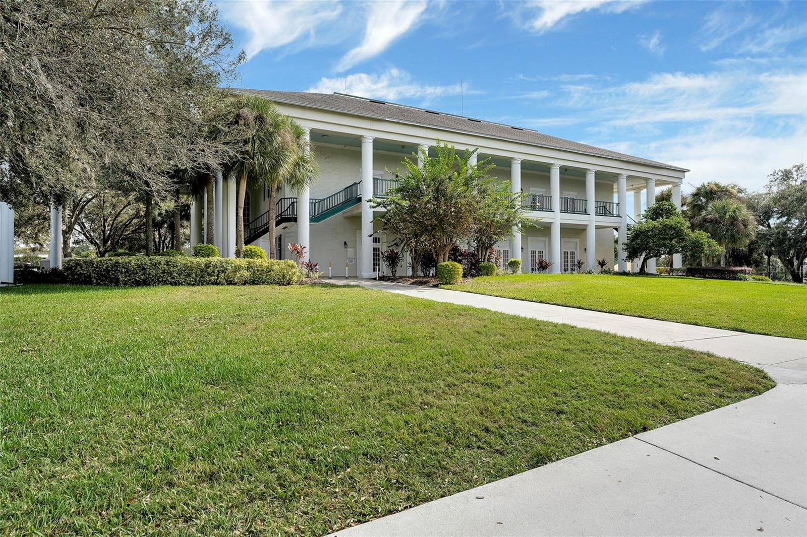 Community amenity: two-story clubhouse with wraparound verandas - 25038 CLIFFORD HL, LEESBURG