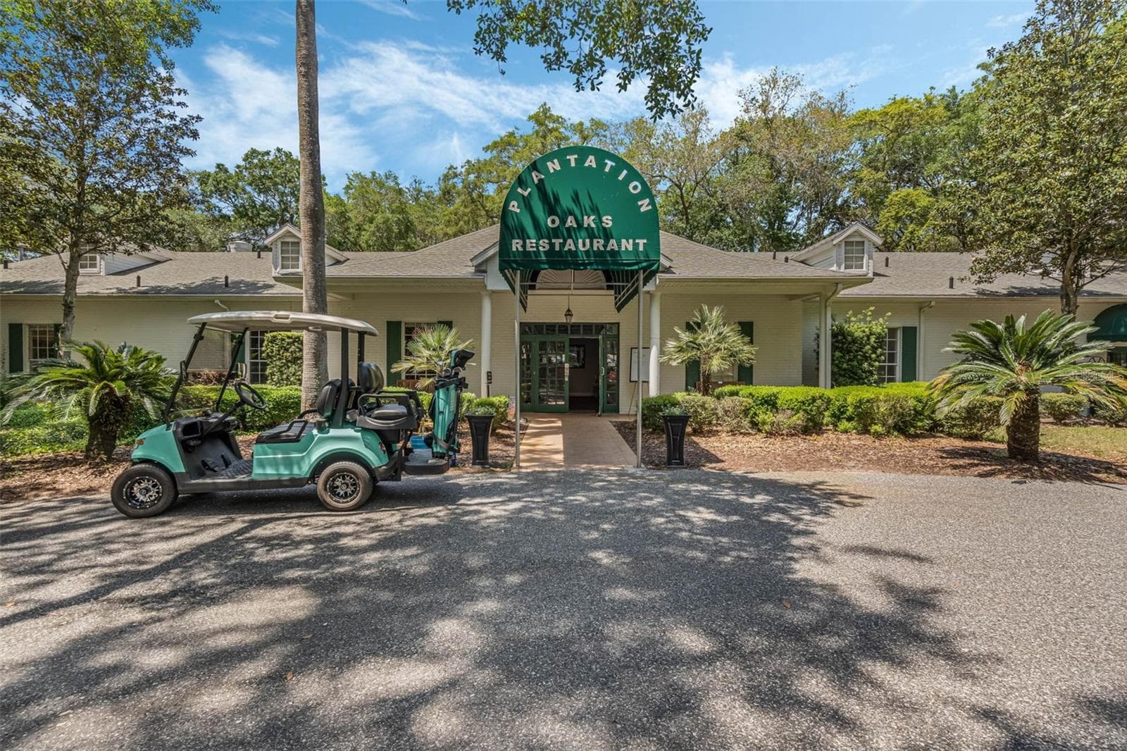 Community amenity: Plantation Oaks Restaurant entrance - 25038 CLIFFORD HL, LEESBURG
