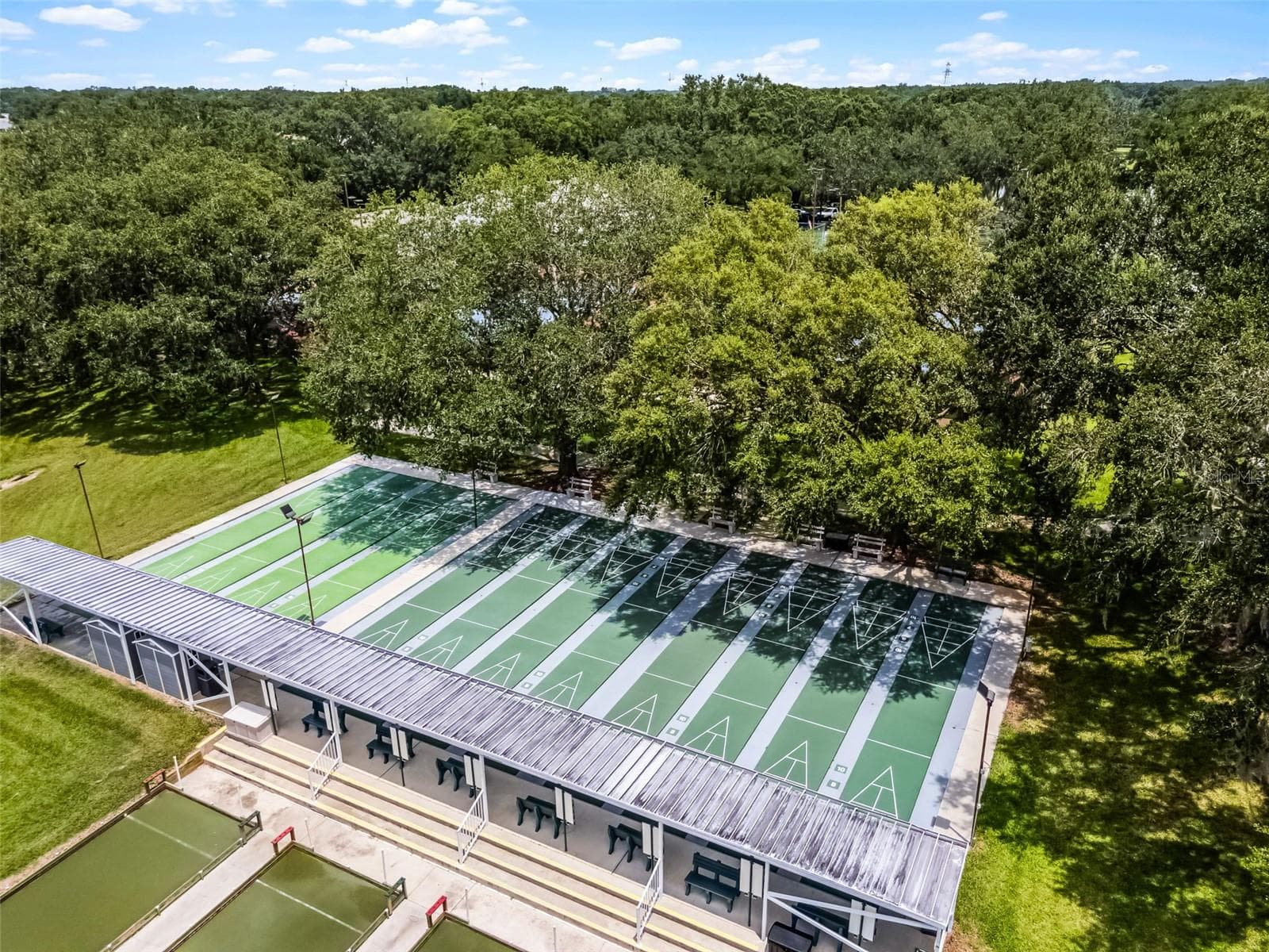 Community amenity: aerial view of the covered shuffleboard courts - 25038 CLIFFORD HL, LEESBURG