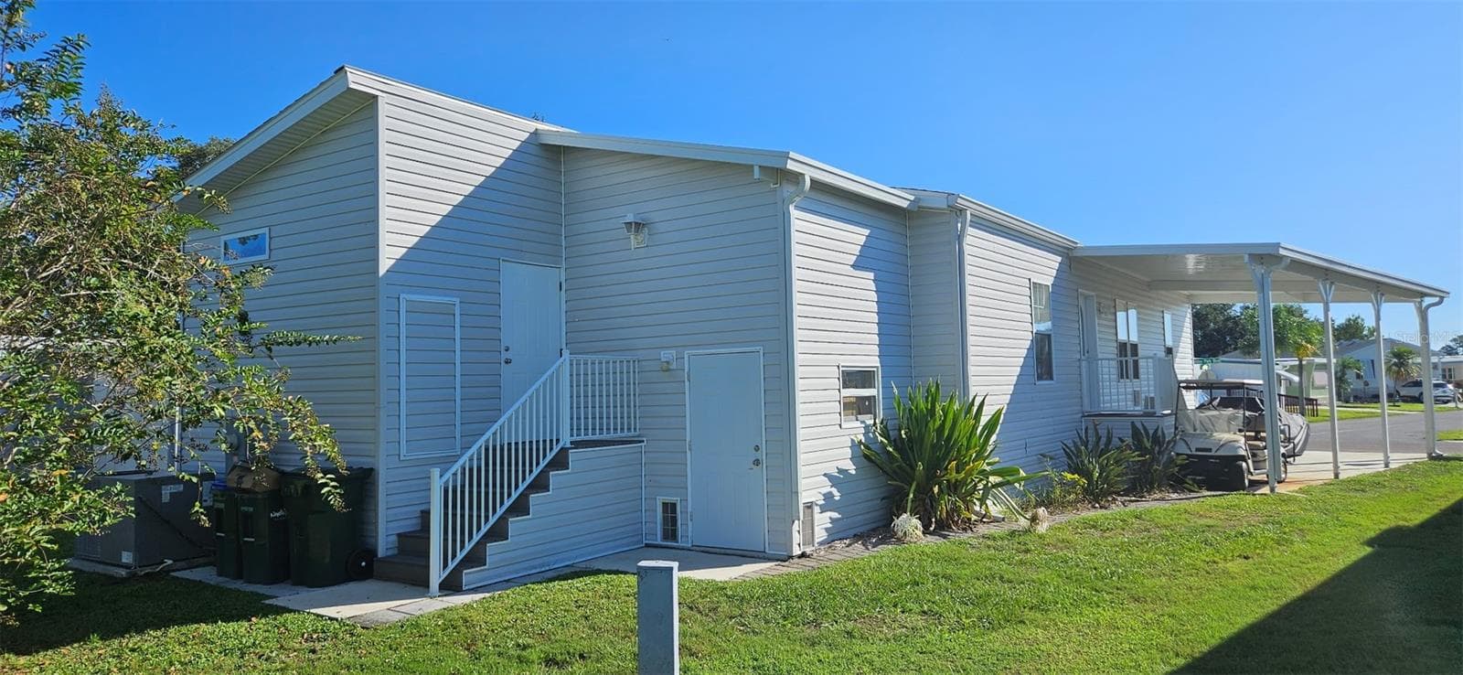 Back of home showing 2 story shed - 5652 HOLIDAY PARK BLVD, NORTH PORT
