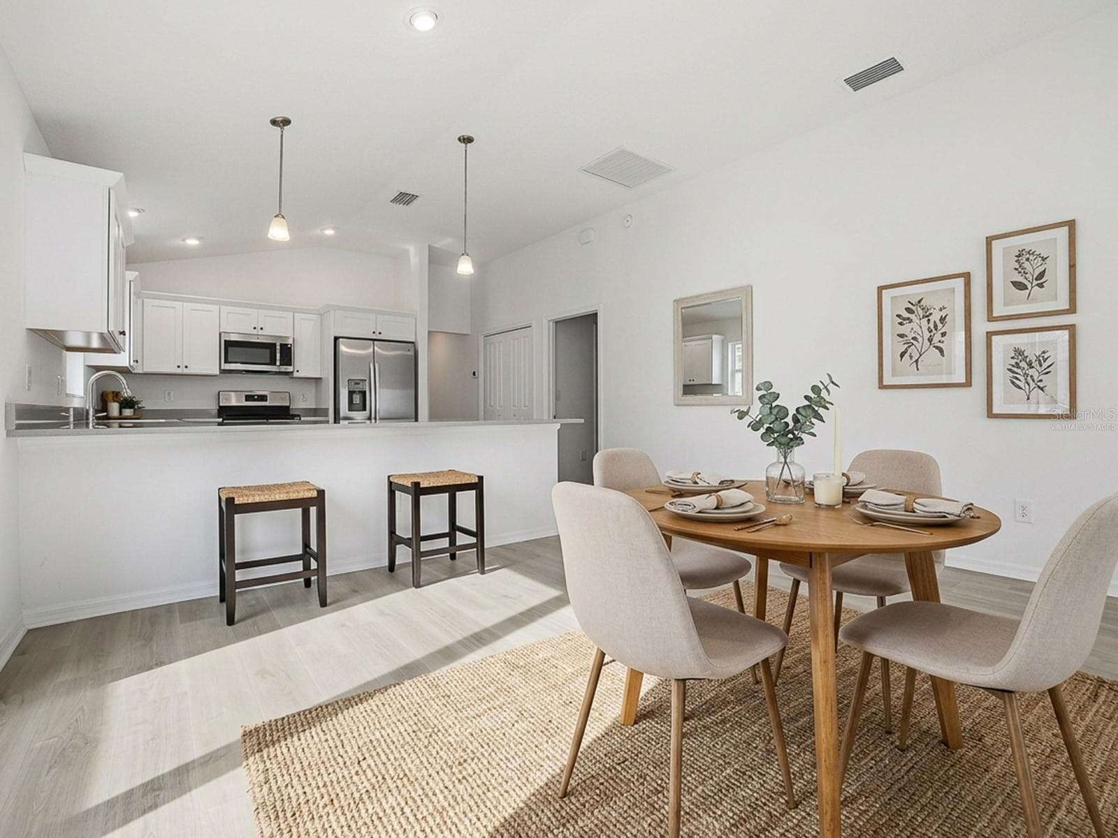 A view of the dining area virtually staged with furniture - 1359 DARREN DR, THE VILLAGES