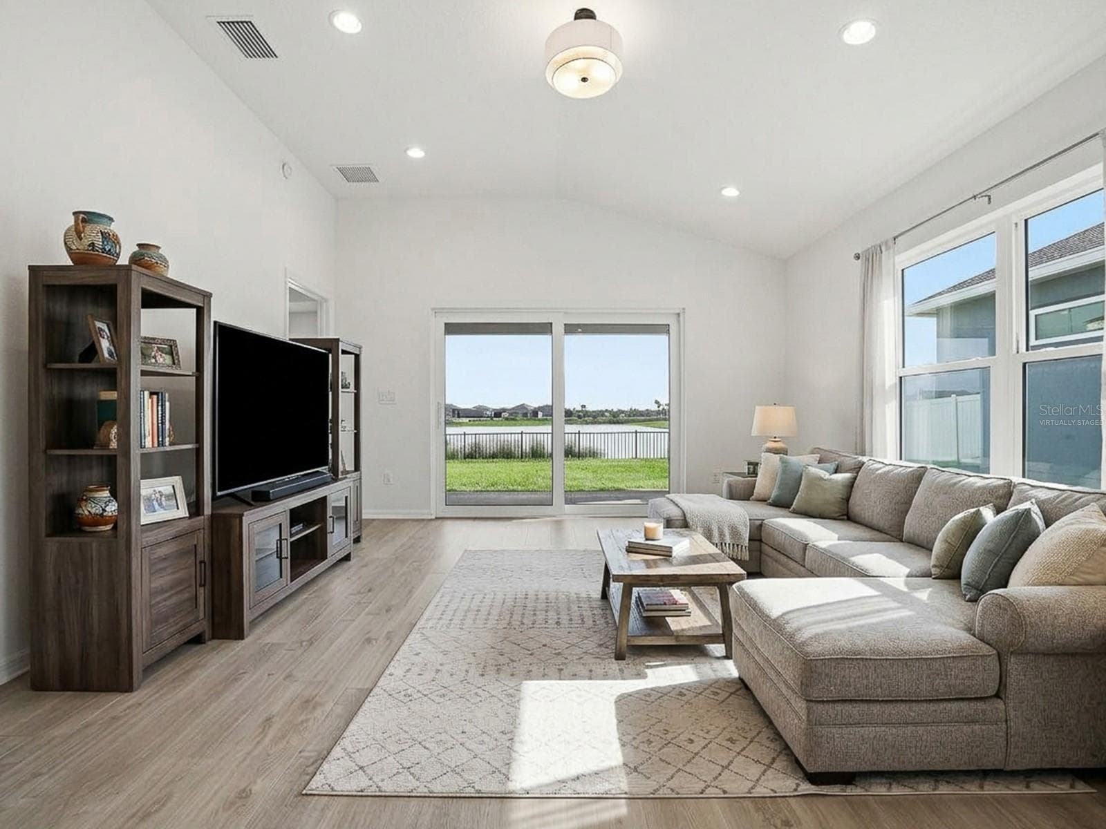 Living room virtually staged with furniture - 1359 DARREN DR, THE VILLAGES