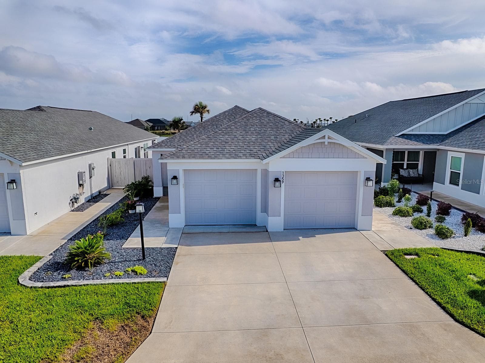 View of home looking straight on from drone - 1359 DARREN DR, THE VILLAGES