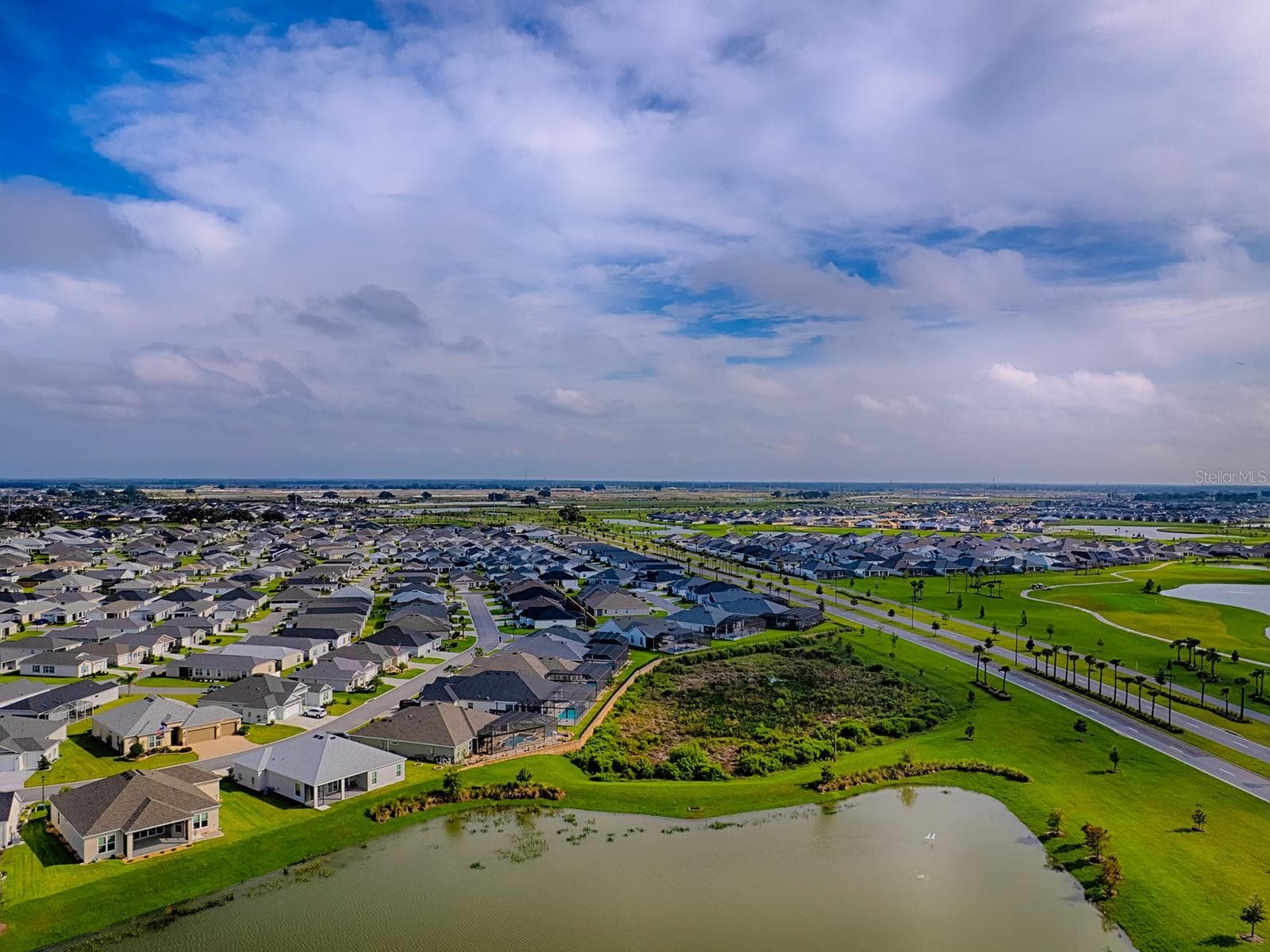 View looking North toward Leesburg and the new hospital and shopping are just starting to scrape land now, you can see just past the houses already up - 1359 DARREN DR, THE VILLAGES