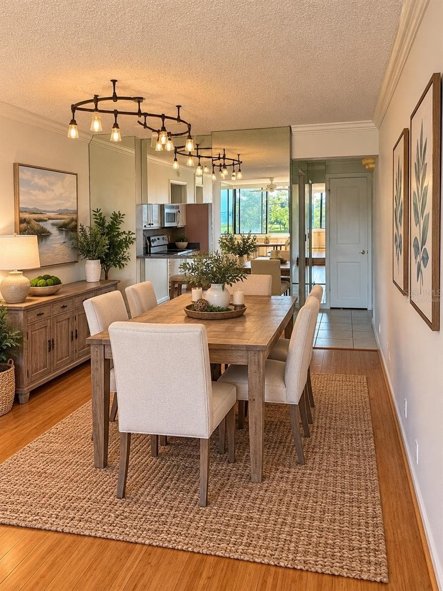 Virtually staged Dining room - 2620 COVE CAY DR #307, CLEARWATER