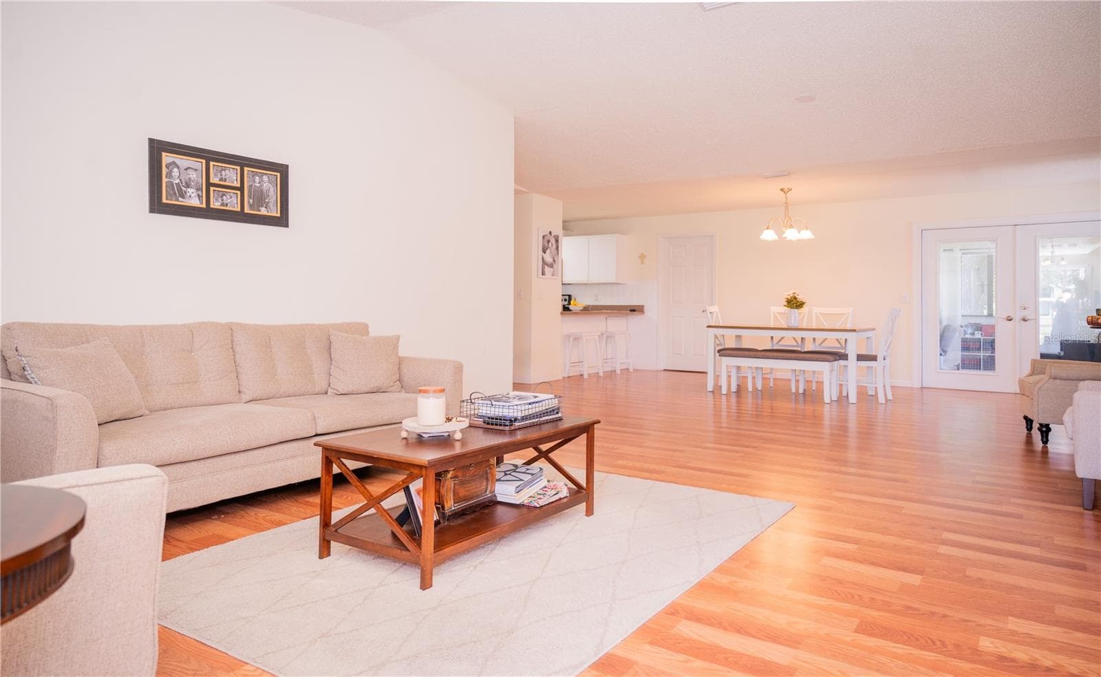 Front door entry leading into the spacious living room. - 57 FORRESTER PL, PALM COAST
