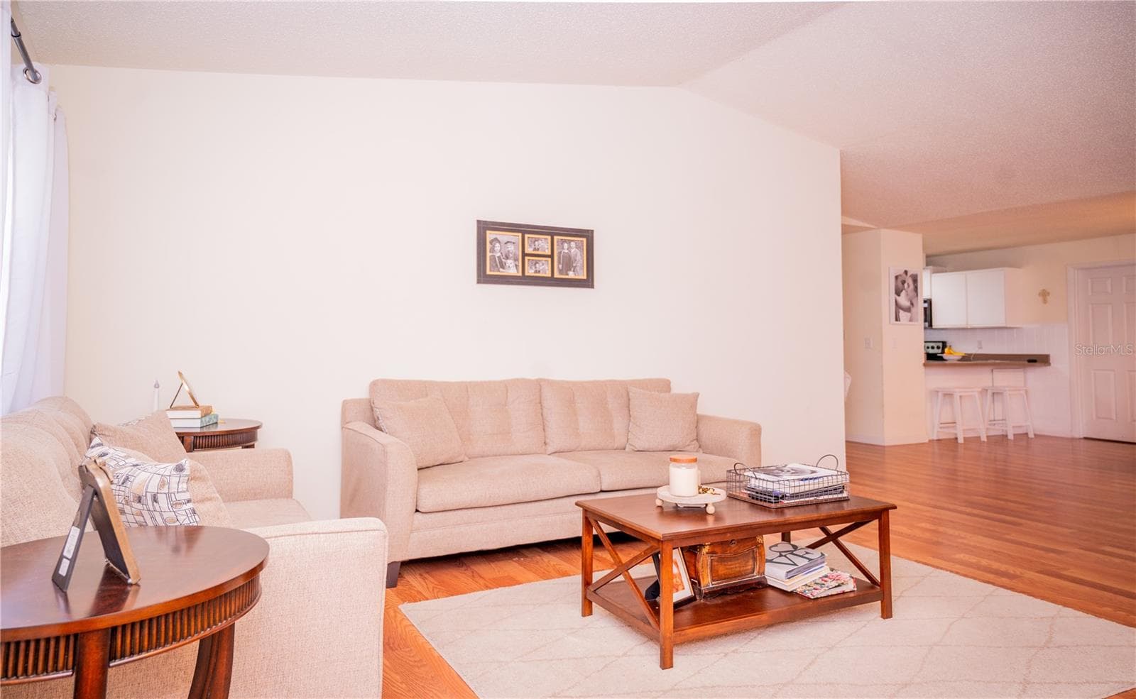 Front door entry leading into the spacious living room. - 57 FORRESTER PL, PALM COAST