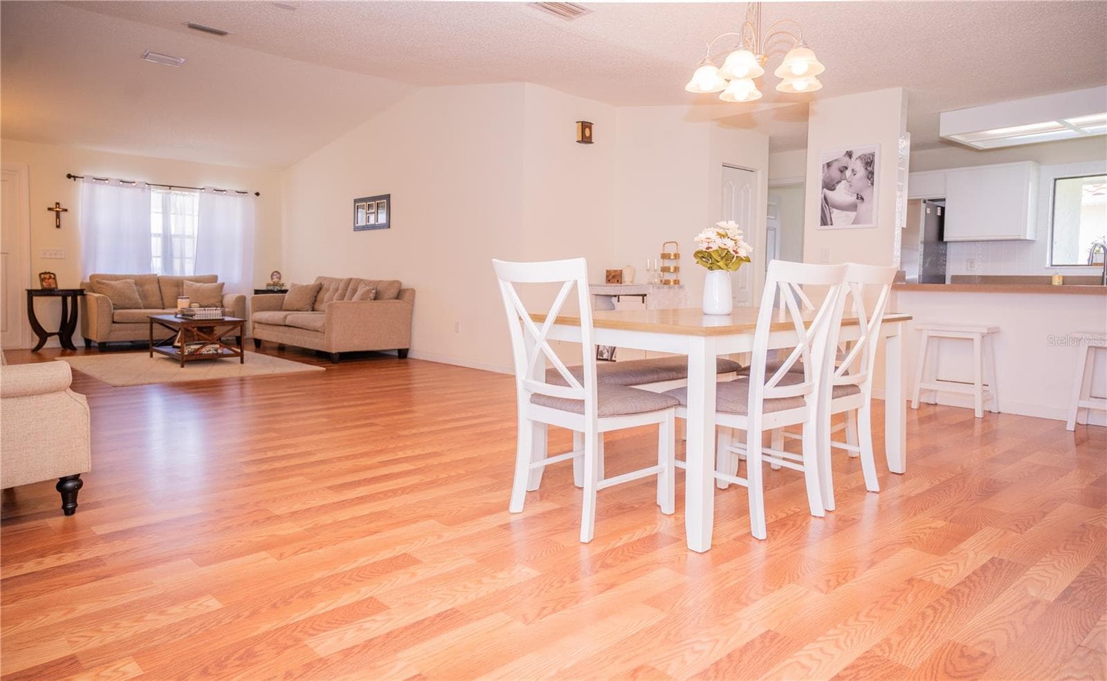 View from the home office looking into the living/family room and dining area. - 57 FORRESTER PL, PALM COAST