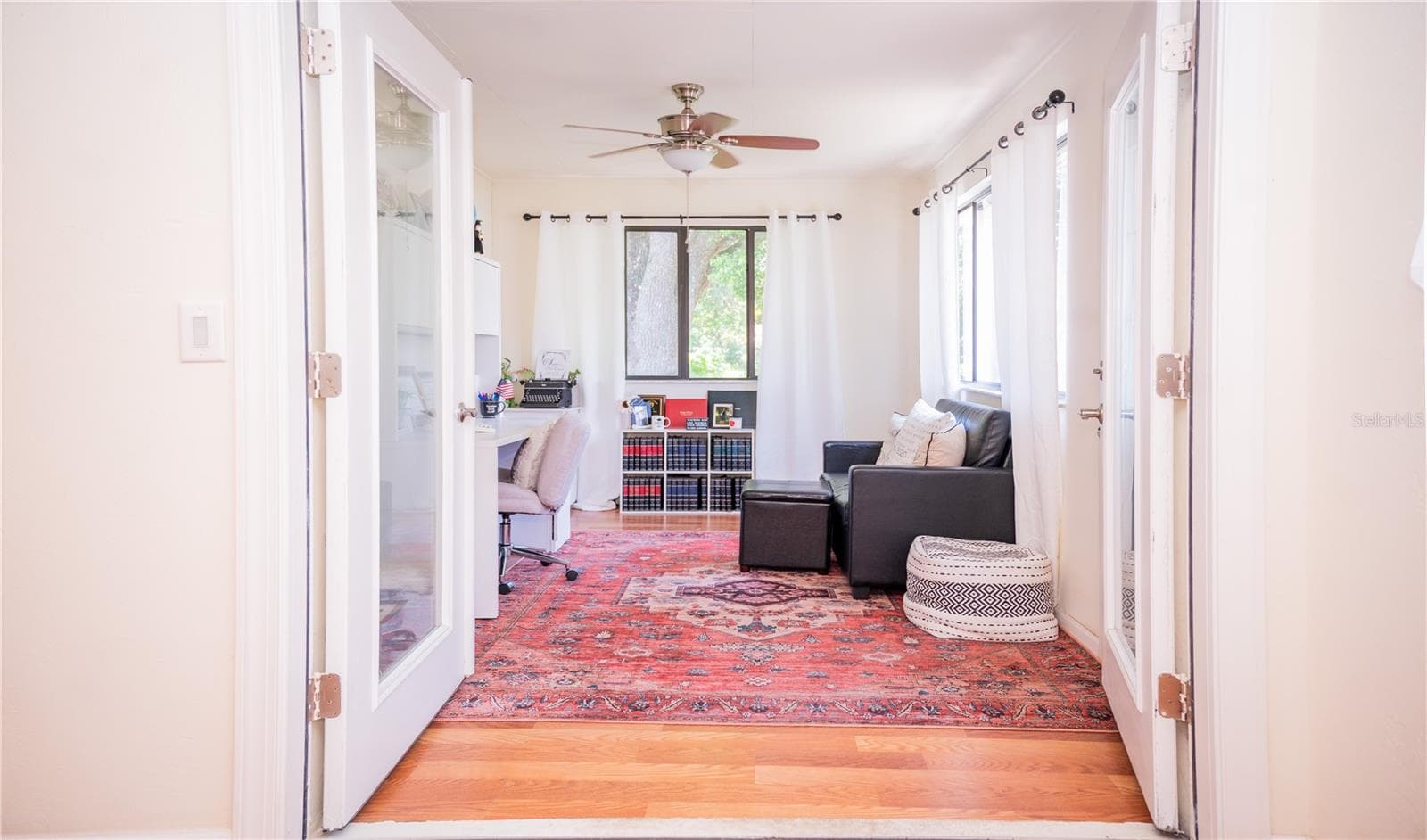 FANTASTIC BONUS SPACE! Currently utilized as a home office, this versatile 150 sq. ft. room is perfectly suited for a home gym, art studio or any purpose requiring privacy. Please note that this square footage is in addition to the 1,412 sq. ft. recorded on the tax rolls. - 57 FORRESTER PL, PALM COAST