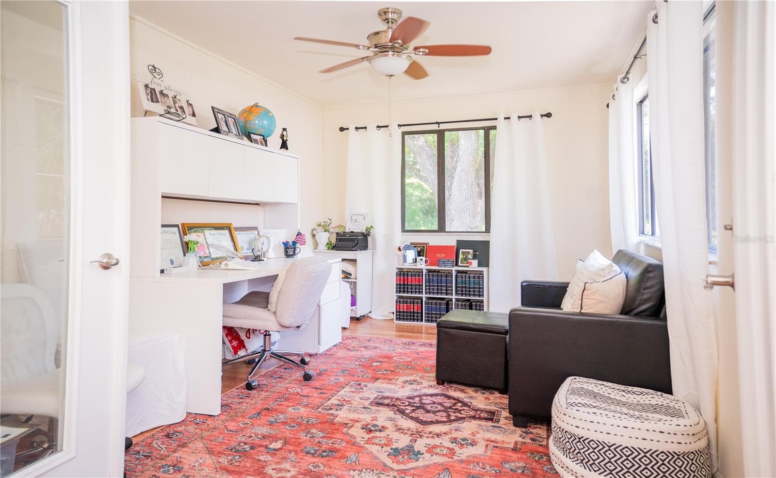 Another view of the spacious home office, perfect for a dedicated workspace or creative studio. - 57 FORRESTER PL, PALM COAST