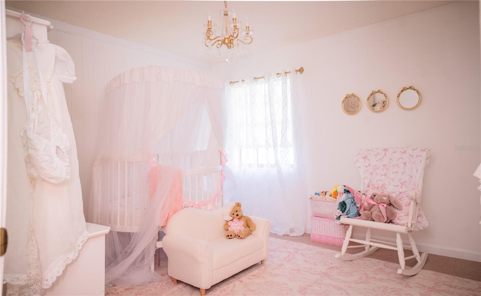 This enchanting second bedroom is currently staged as a serene nursery, but its flexible layout makes it perfect for a home office, gym, studio, or whatever your imagination can create. - 57 FORRESTER PL, PALM COAST