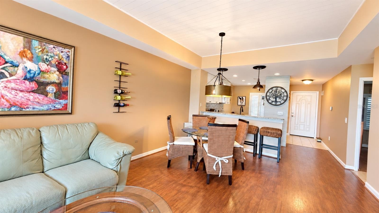 Bright open floor plan, shiplap ceiling, and Pergola floors are offered in this 2 bedroom, 2 bathroom condo - 26397 NADIR RD #103, PUNTA GORDA