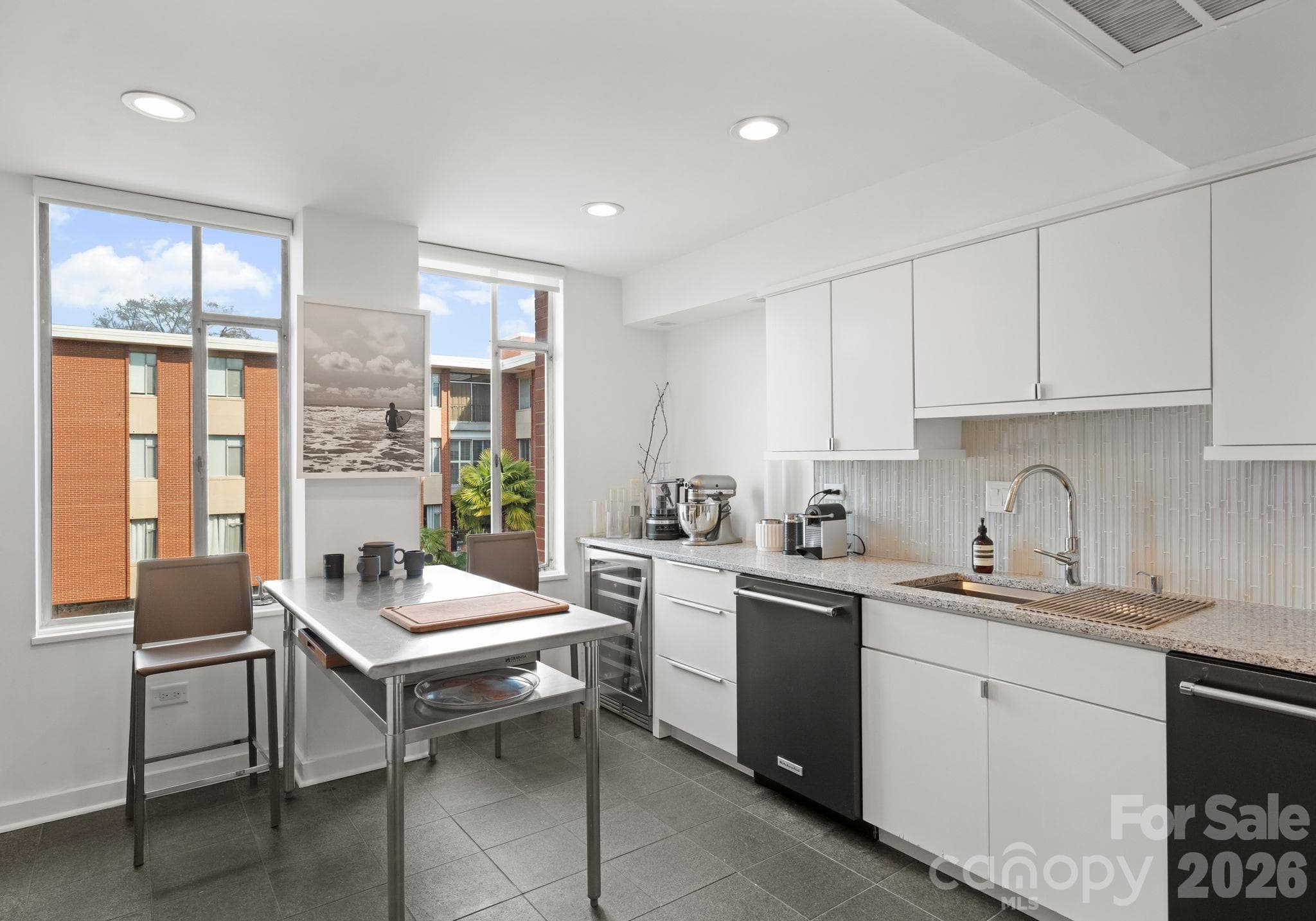 Gourmet kitchen offering two dishwashers. - 1300 Queens Road, Charlotte