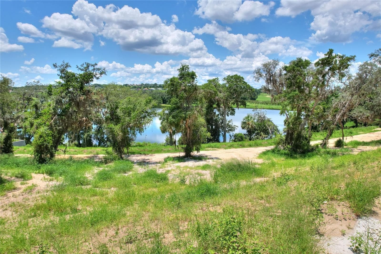 Lake view from Lot - 177 TRANQUIL MIRROR LAKE CT #Lot 5, CLERMONT