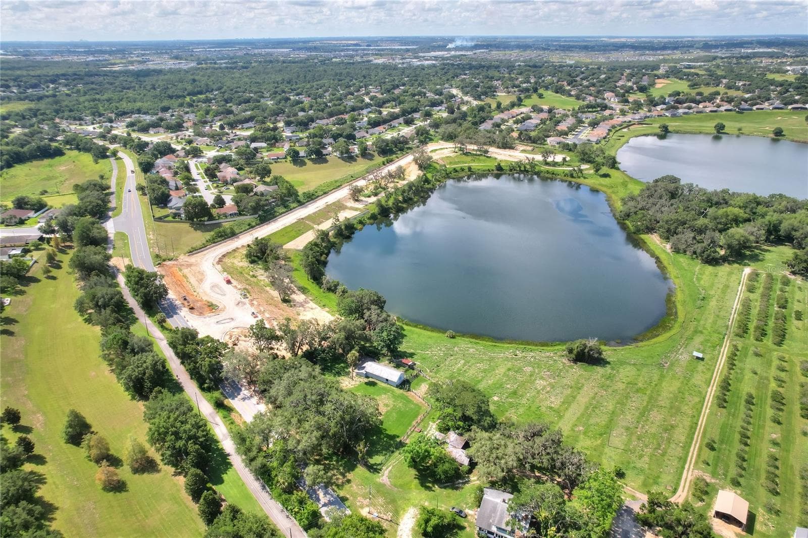 Site Looking SW - 177 TRANQUIL MIRROR LAKE CT #Lot 5, CLERMONT