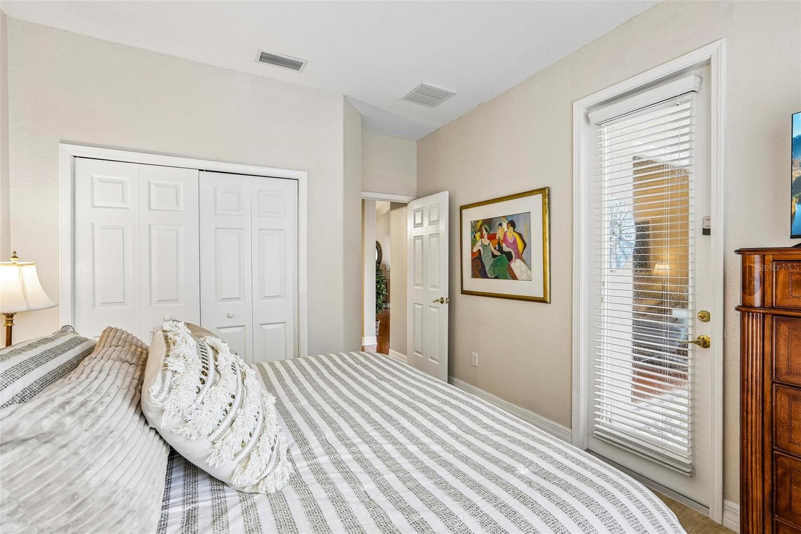 2nd BR w dble closets/door to pool - 27443 MISTFLOWER DR, WESLEY CHAPEL
