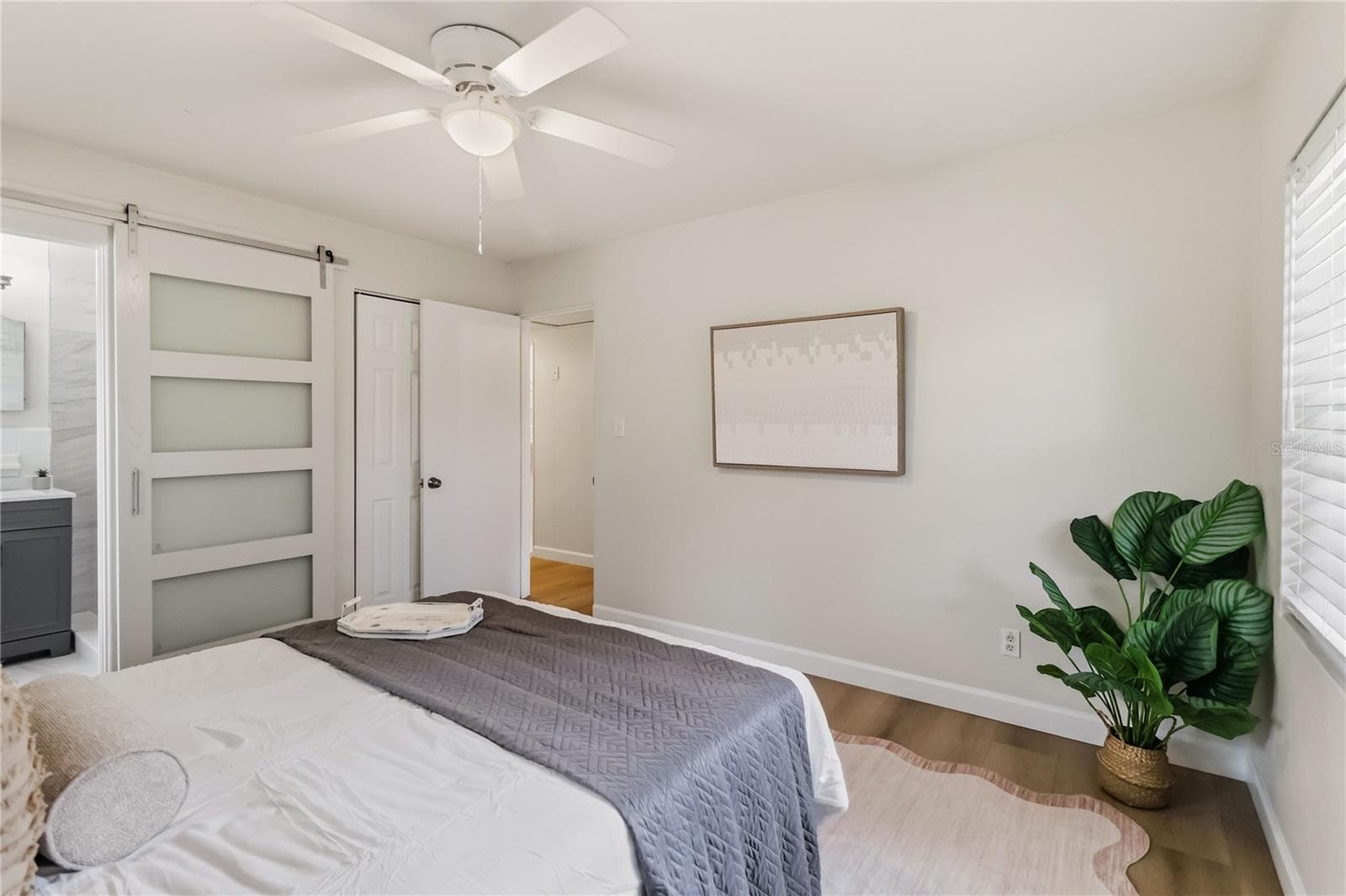 Primary Bedroom is conveniently located with just steps to the en-suite - 7040 LAKE DR, ORLANDO