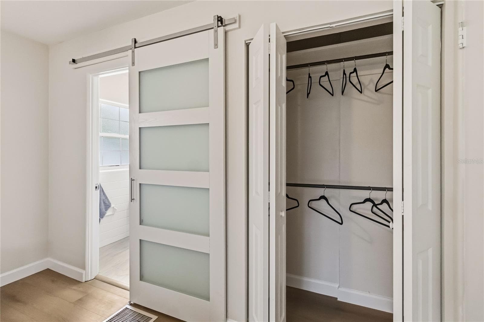 Primary Bedroom has well thought out storage also including a hall closet directly across from the Bedroomfor Seasonal or extra Clothing & Storage. - 7040 LAKE DR, ORLANDO