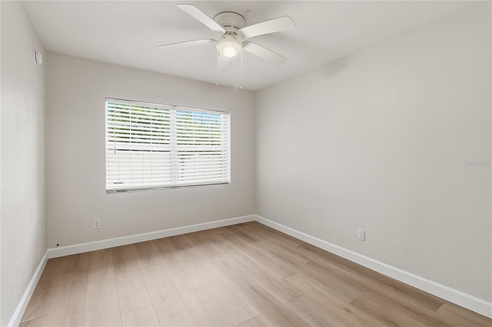 Bedroom 2 has nice lighting due to a lovely size window, but now direct sun light due to location - 7040 LAKE DR, ORLANDO