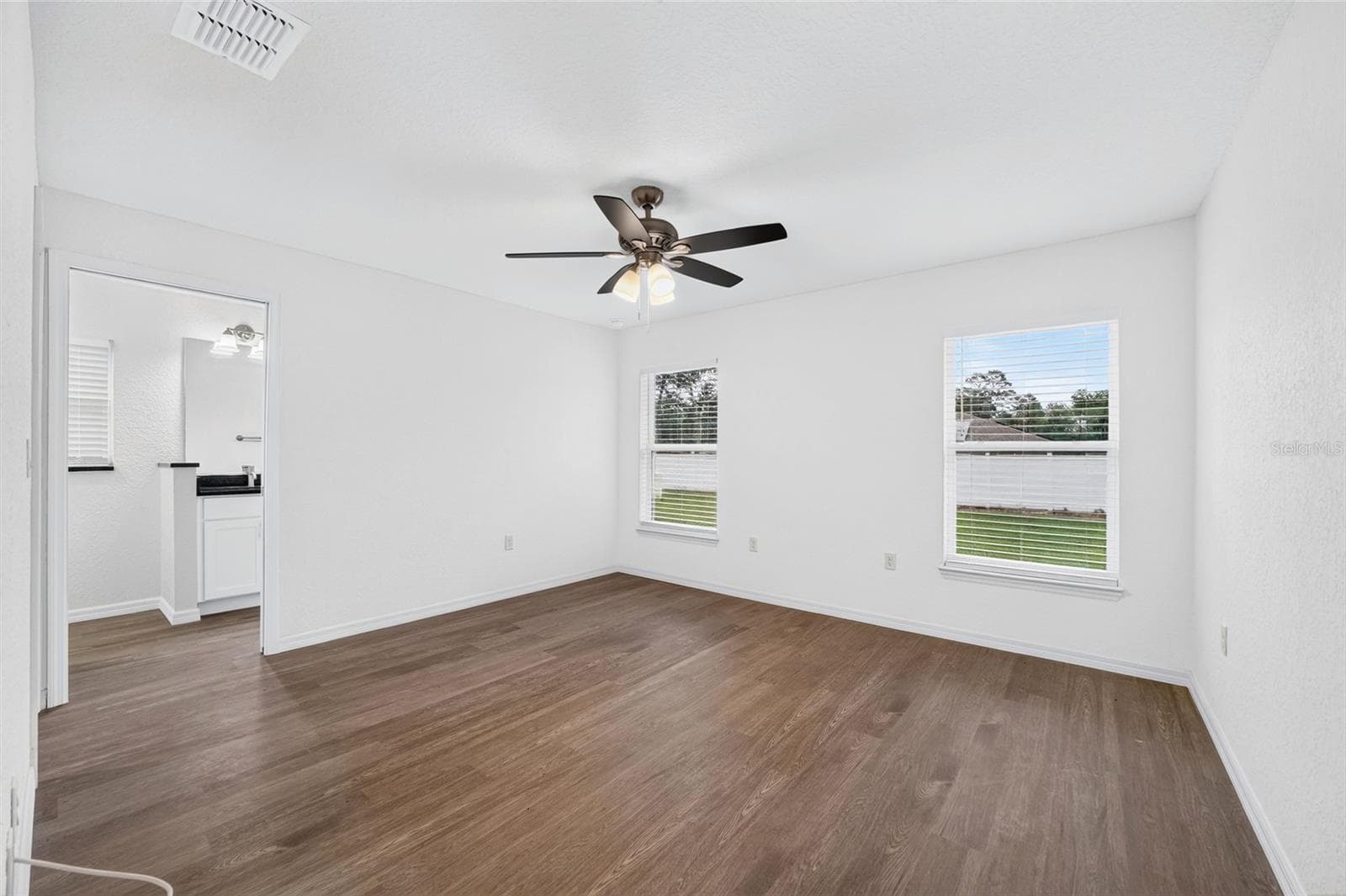 PRIMARY BEDROOM FITS A KING BED - 3 FISHER WAY PL, OCKLAWAHA