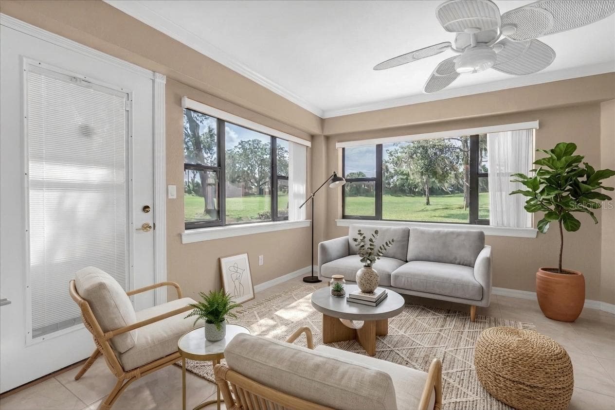 Florida room -virtual staged for other set up ideas (not included) - 9126 BASSETT LN, NEW PORT RICHEY