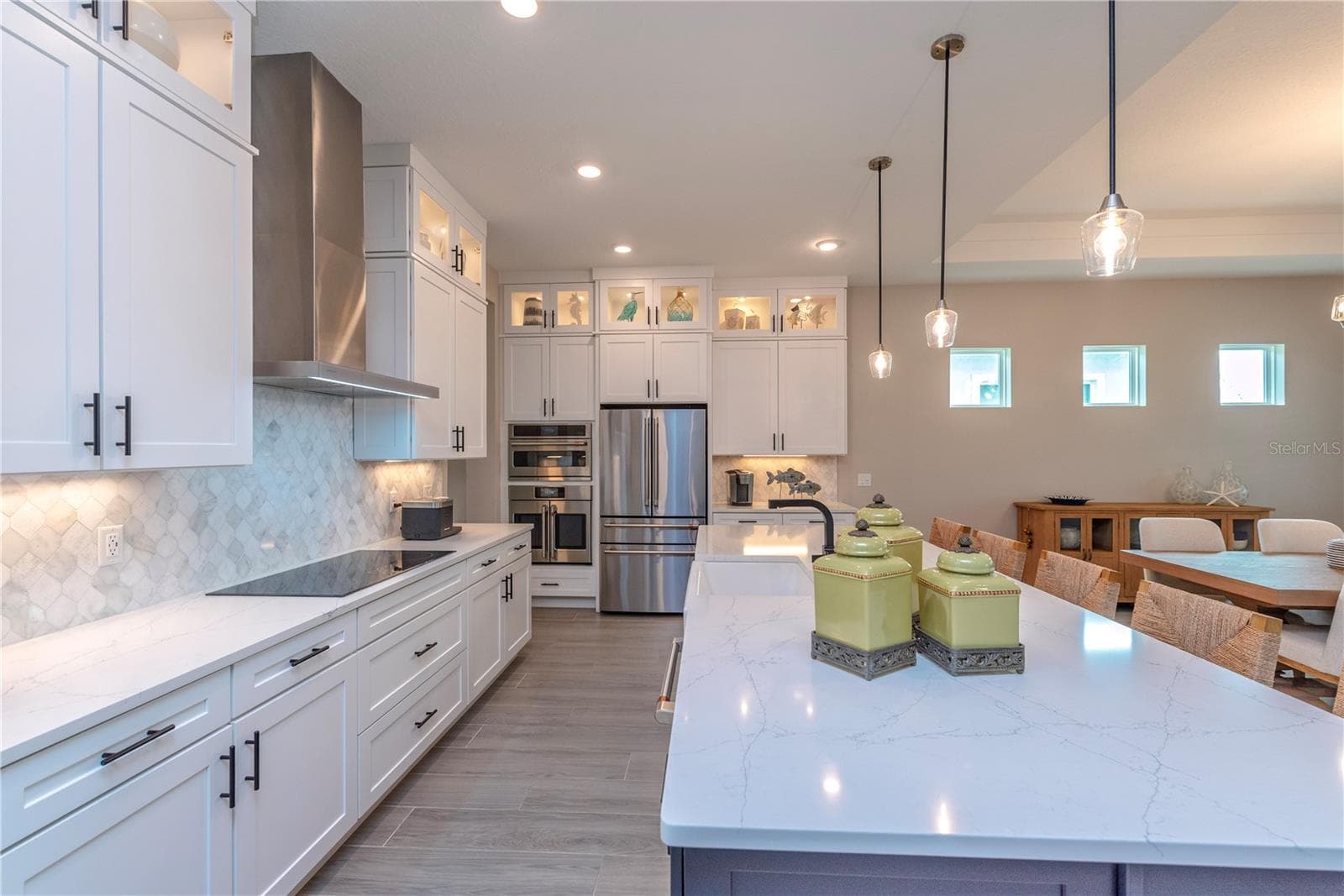 Gourmet kitchen with upgraded quartz counters. - 10706 TORCHWOOD SEA WAY, SAN ANTONIO