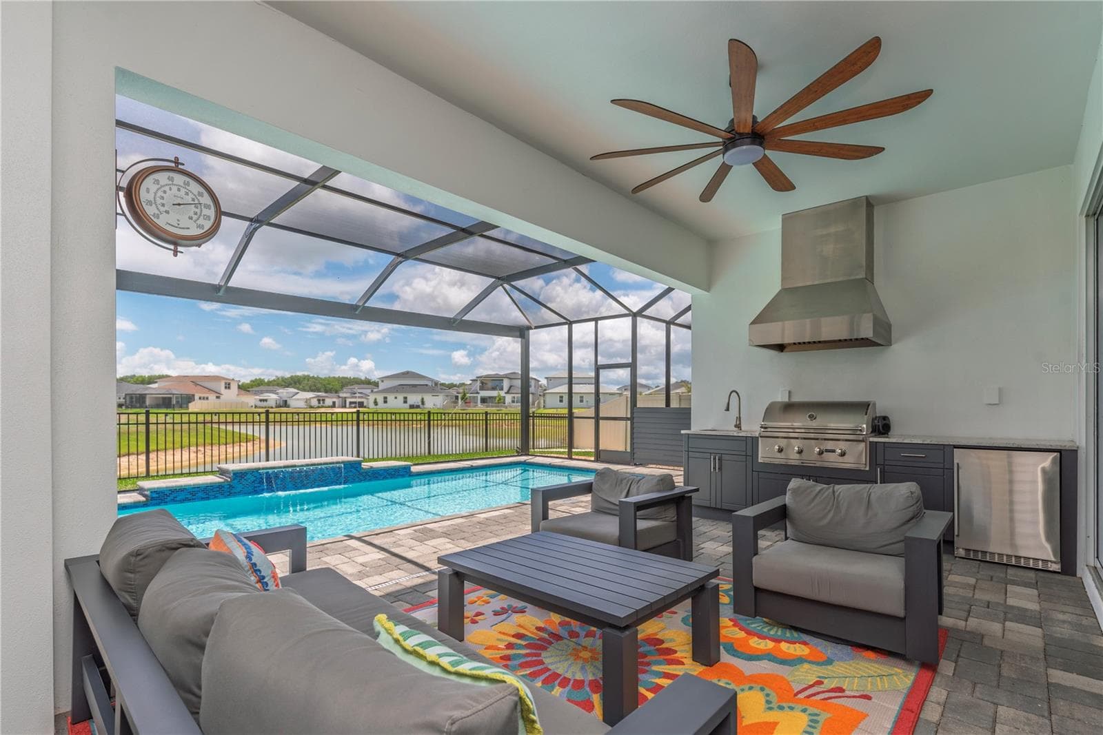 Covered pool lanai with outdoor kitchen. - 10706 TORCHWOOD SEA WAY, SAN ANTONIO