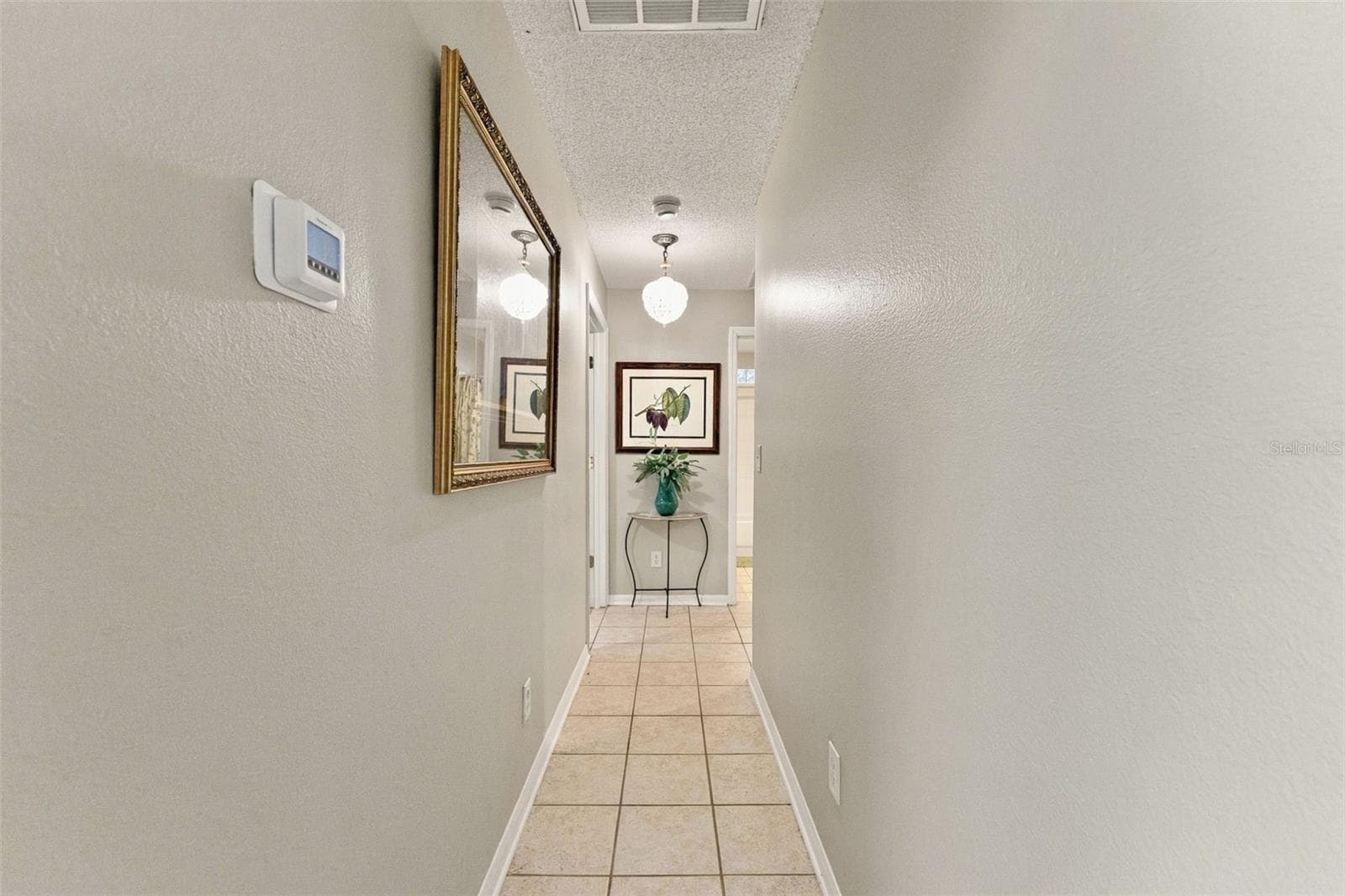 hallway to bedrooms - 609 CAPE COD CIR, VALRICO