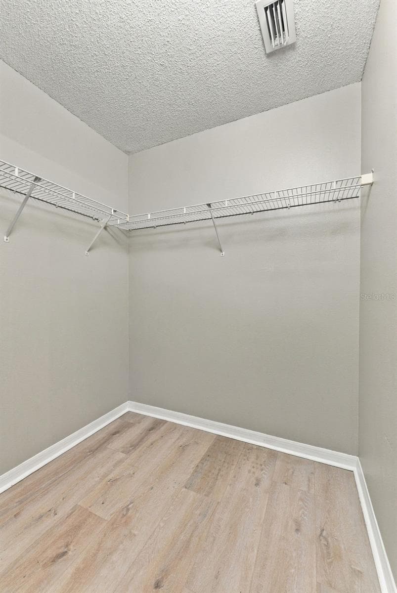 primary walk in closet - 609 CAPE COD CIR, VALRICO