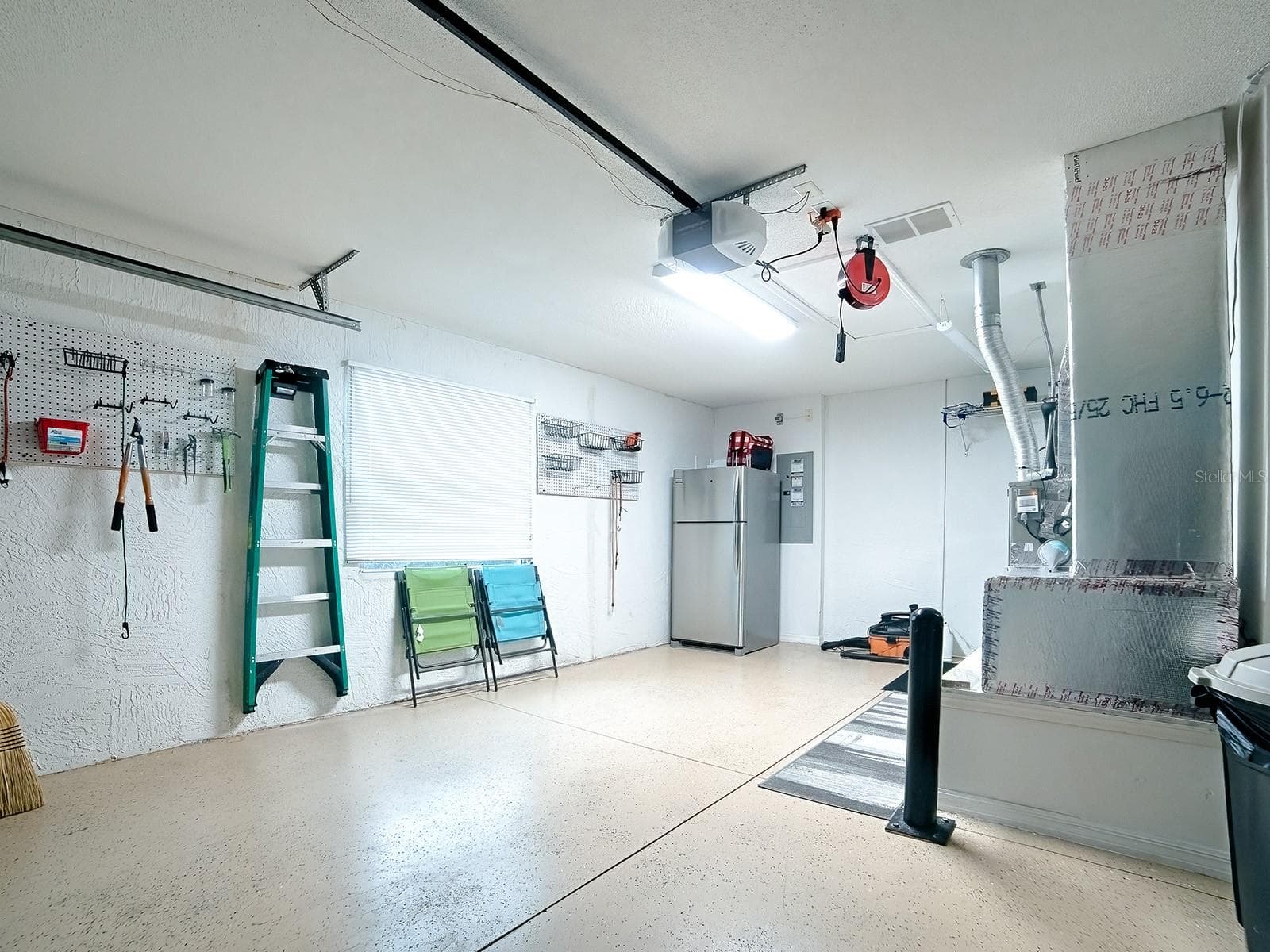 Newly epoxied garage floors - 1530 BARNWELL PL, THE VILLAGES