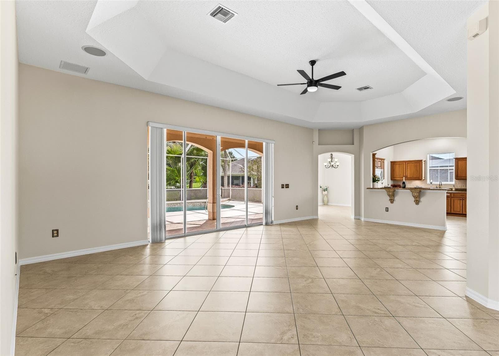 Living room with tray ceiling - 1802 ESTAFANA WAY, THE VILLAGES