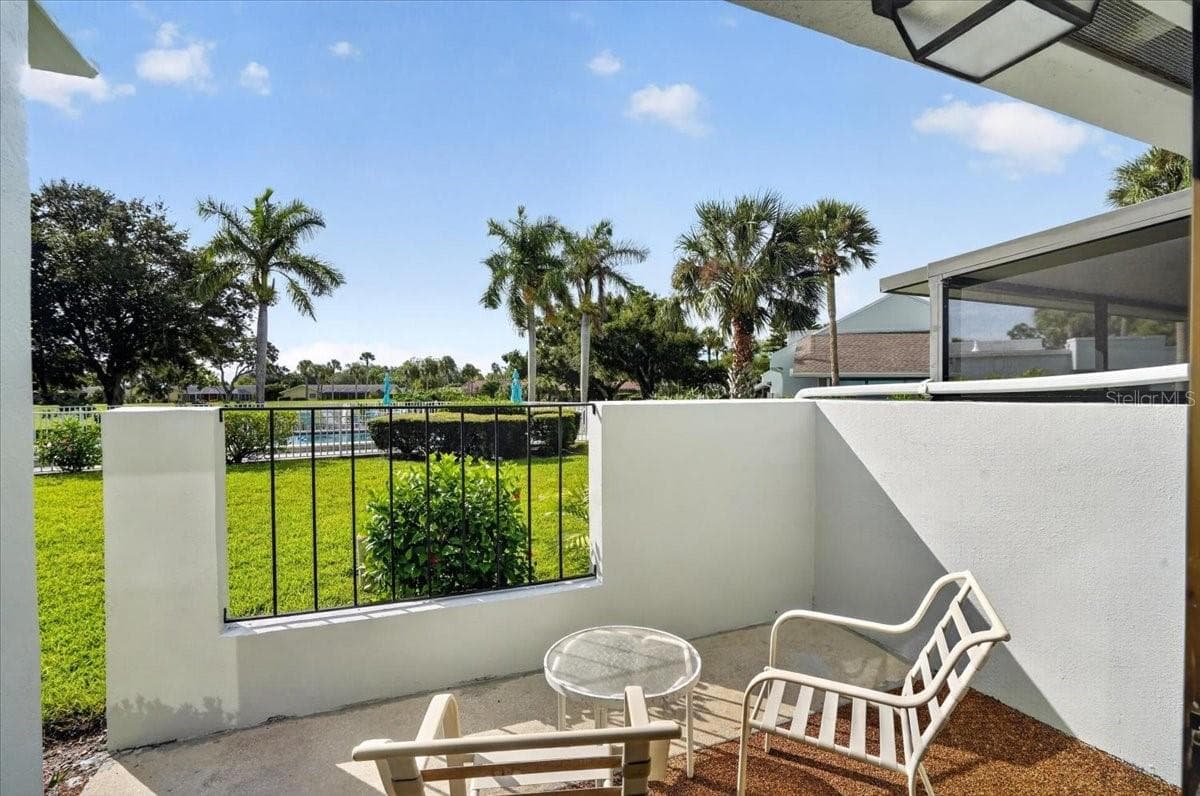 patio from the master bedroom - 2319 LAKESIDE MEWS #B3, SARASOTA