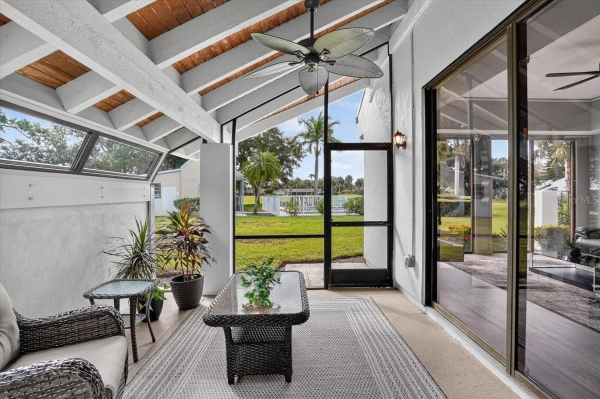 lanai with sliders from kitchen and living room - 2319 LAKESIDE MEWS #B3, SARASOTA