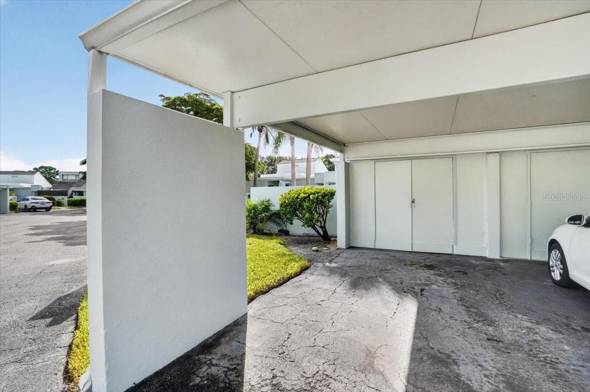 covered parking and storage closet - 2319 LAKESIDE MEWS #B3, SARASOTA