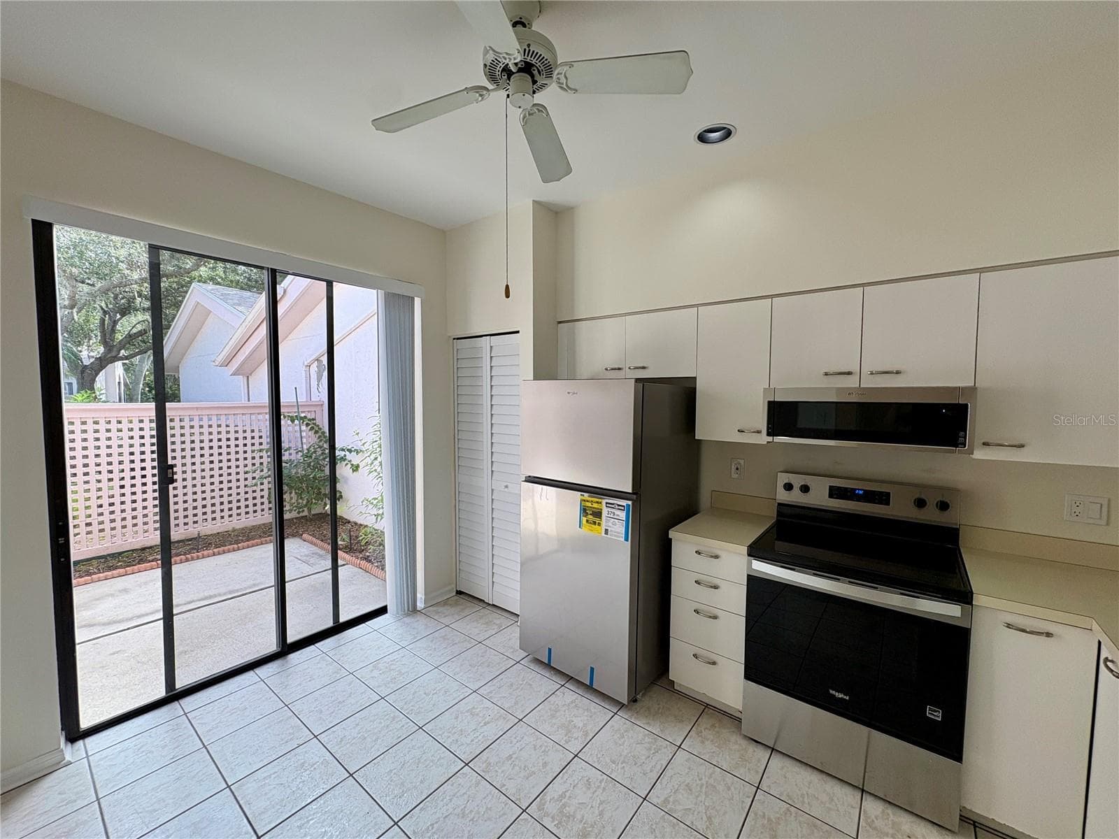 Kitchen Slider View Vacant - 5535 HAMPSTEAD HEATH #45, SARASOTA
