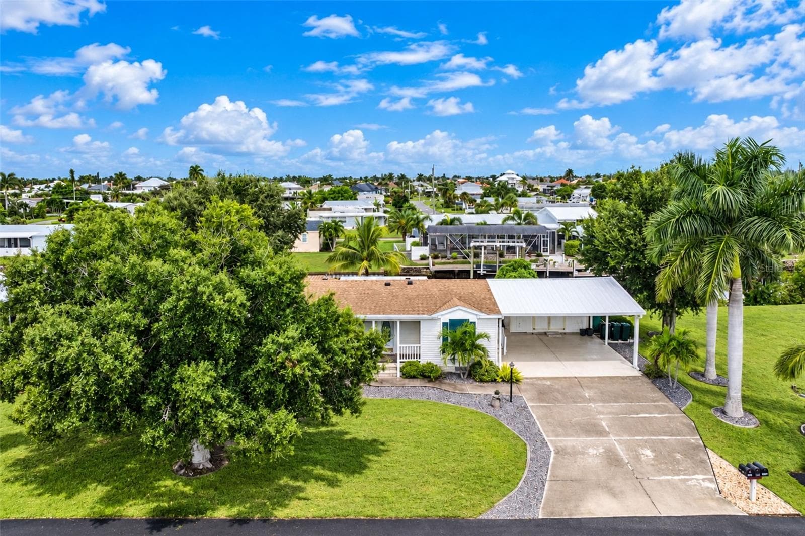 Manufactured Home at 4191 PELICAN POINTE DR, PUNTA GORDA, photo 3 of 60