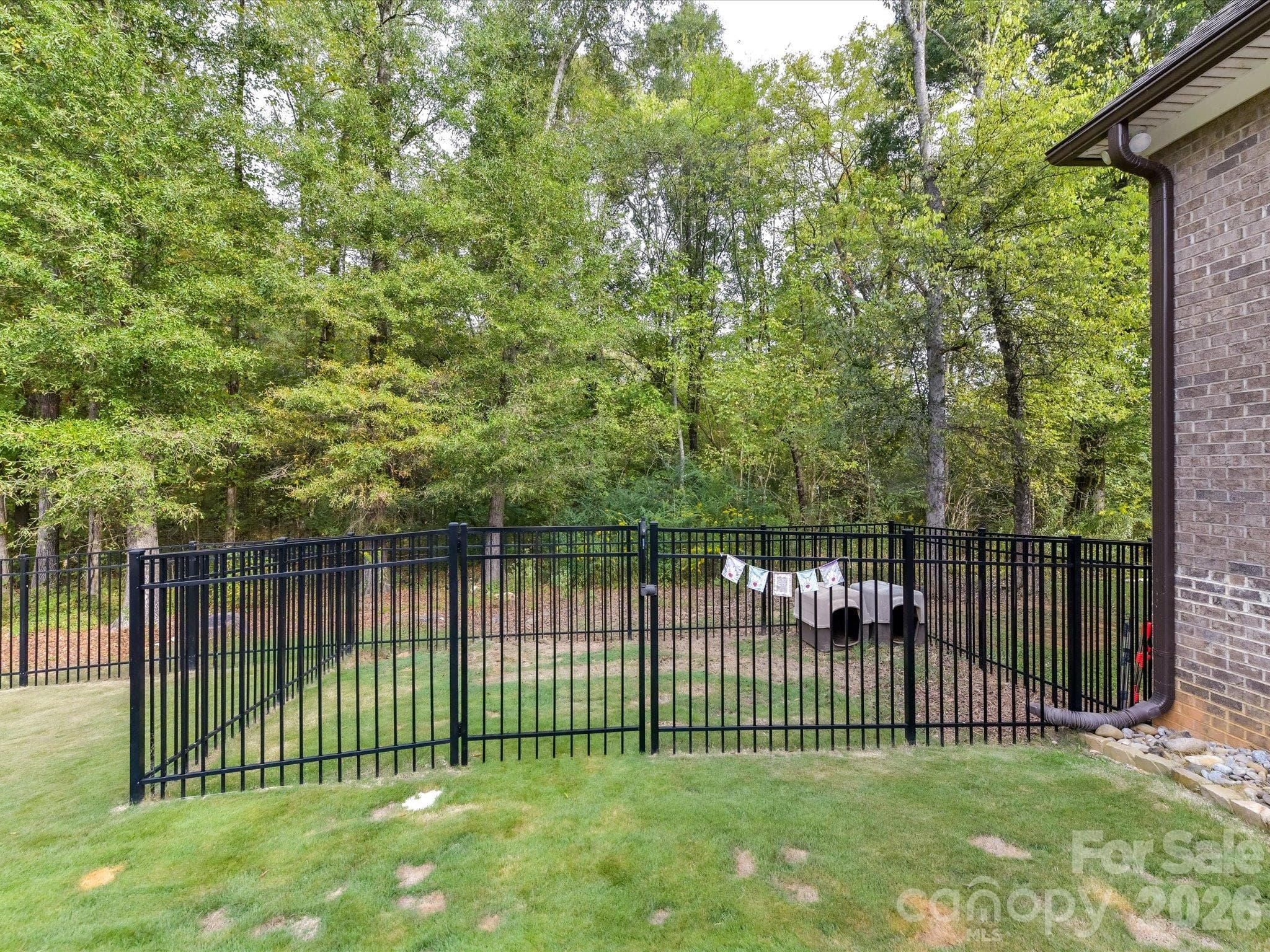 Seperate fenced area within fenced yard for dogs or children play area - 5923 Rocky River Road N, Indian Trail