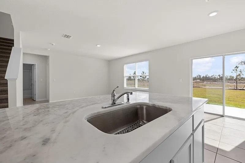 Kitchen looking towards living area - 17249 WHEATBERRY BLVD, PARRISH