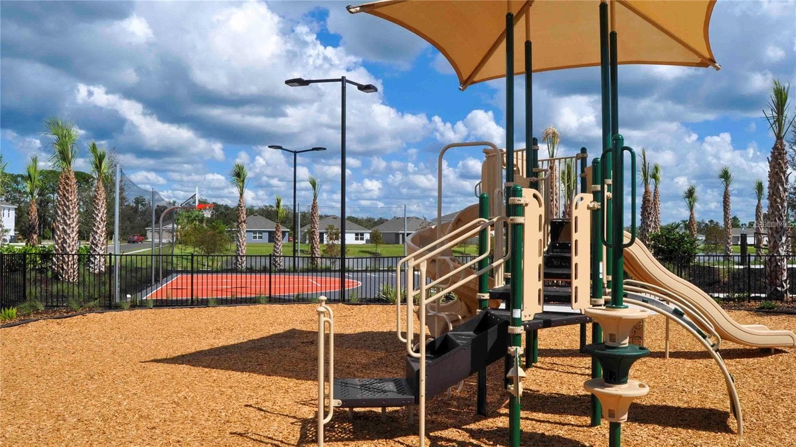 Play ground with basket ball court behond - 17249 WHEATBERRY BLVD, PARRISH
