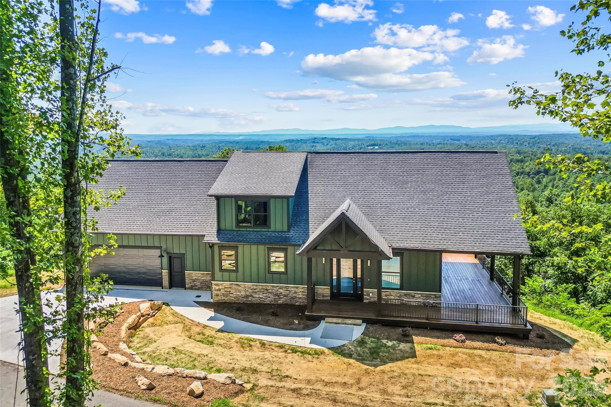 4898 Soaring Top Lane offers 3 floors of versatile floor plan, including a second complete living space on the lower level - 4898 Soaring Top Lane, Lenoir