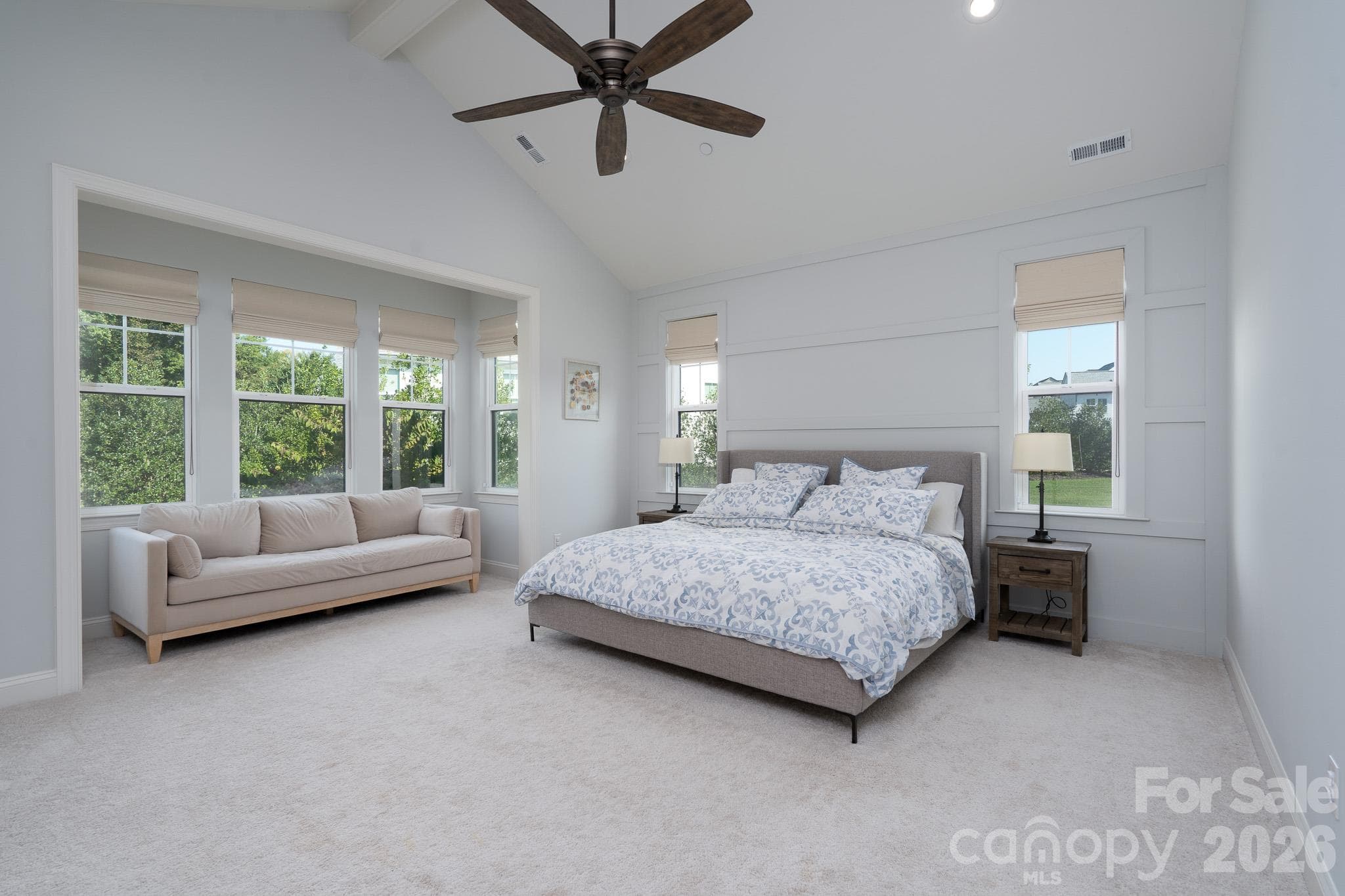 Expanded Primary Suite offers all the room you'll need plus a Sitting area surrounded by windows with view of back yard. - 9588 Pacing Lane NW, Concord