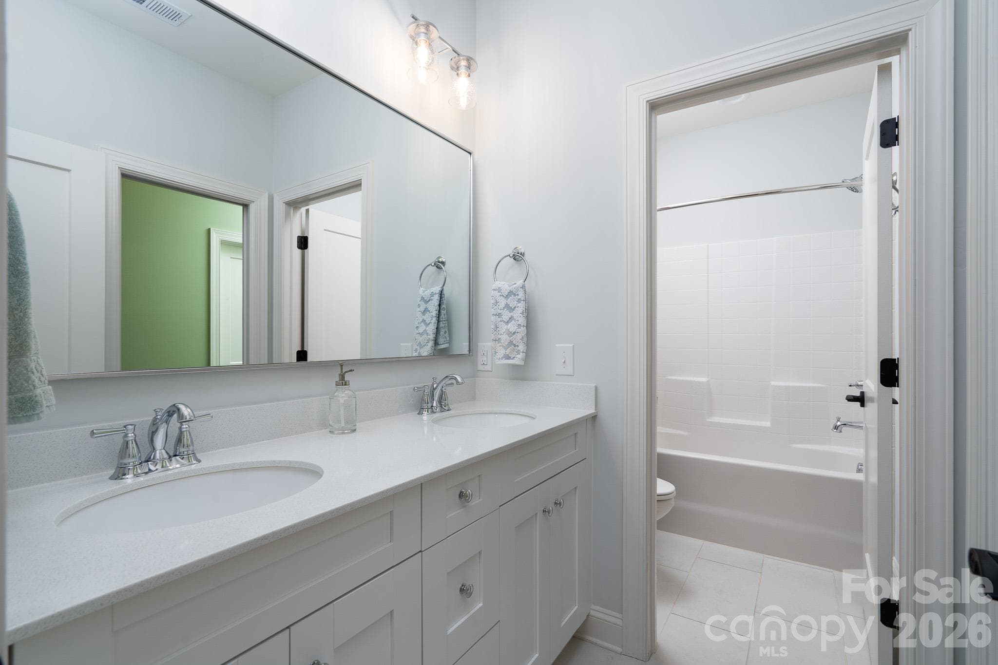 Second floor Hall Bathroom with private restroom and Tub/Shower.  Largest Bedroom has private access - 9588 Pacing Lane NW, Concord