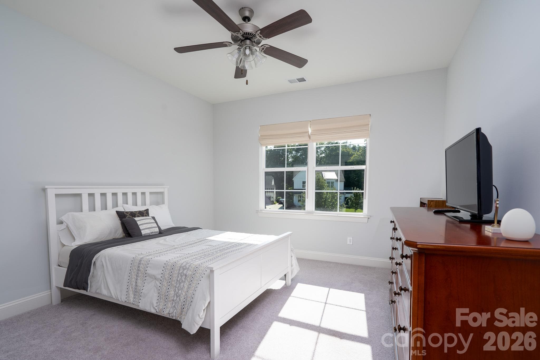 Bright guest Bedroom facing the green space - 9588 Pacing Lane NW, Concord