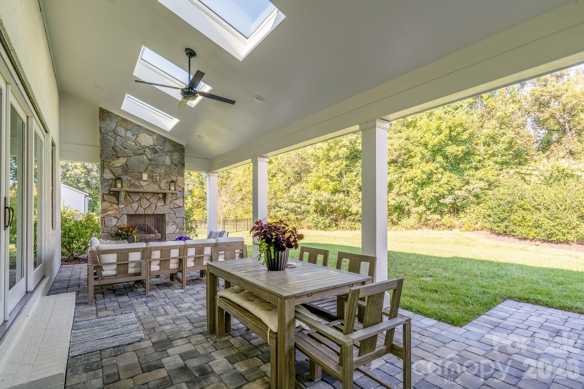 Back Porch is covered, has bright Sky lights and Ceiling fan - 9588 Pacing Lane NW, Concord