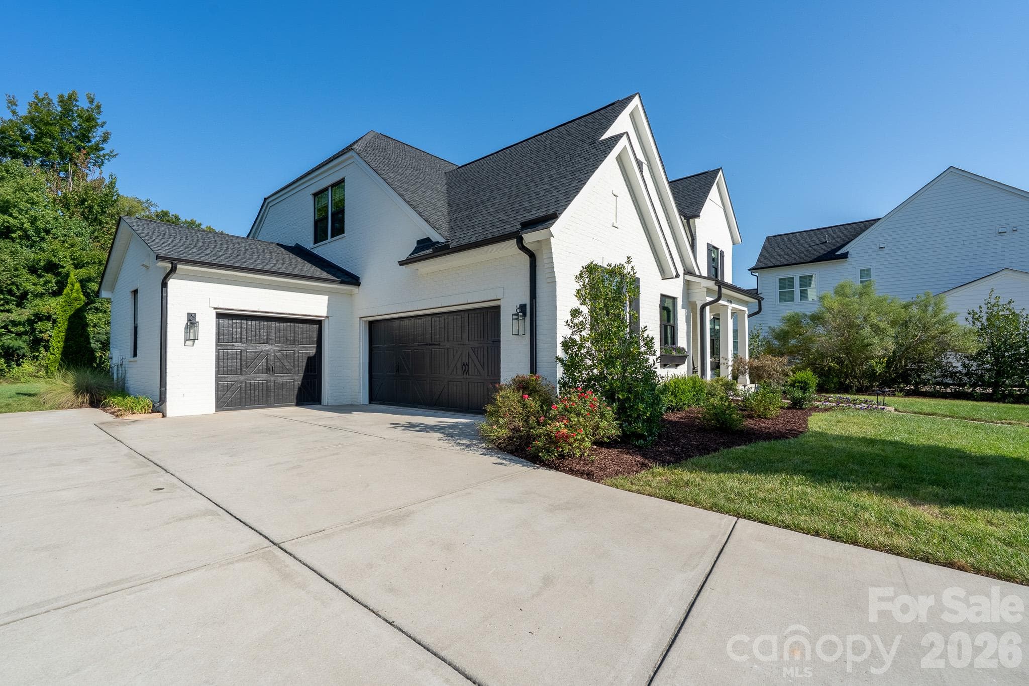 Three Car attached Garage with extra wide driveway for additional parking - 9588 Pacing Lane NW, Concord